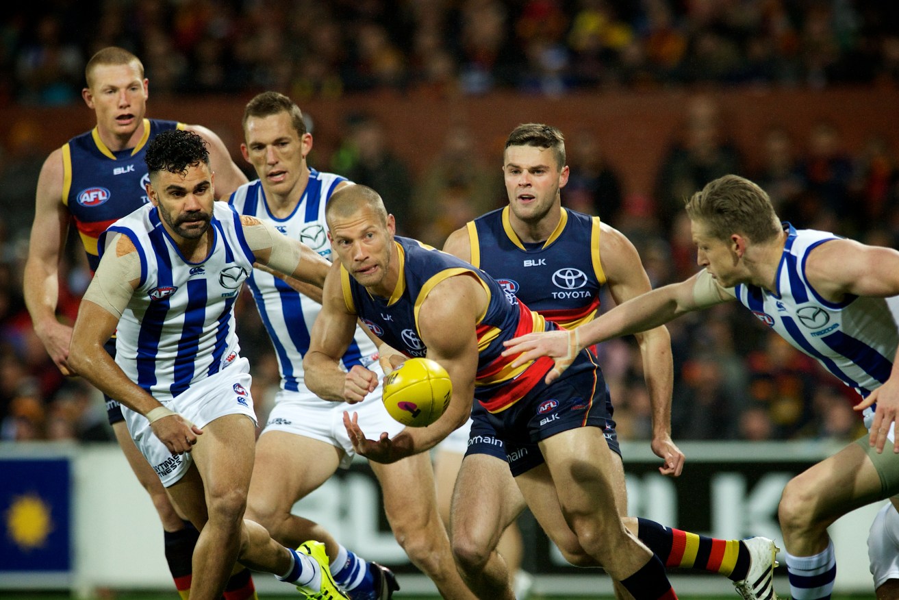 IN AND UNDER: Scott Thompson had an equal-team-high six clearances in his last home game for the Crows - against the Kangaroos in last year's Elimination Final. Photo: Michael Errey / InDaily