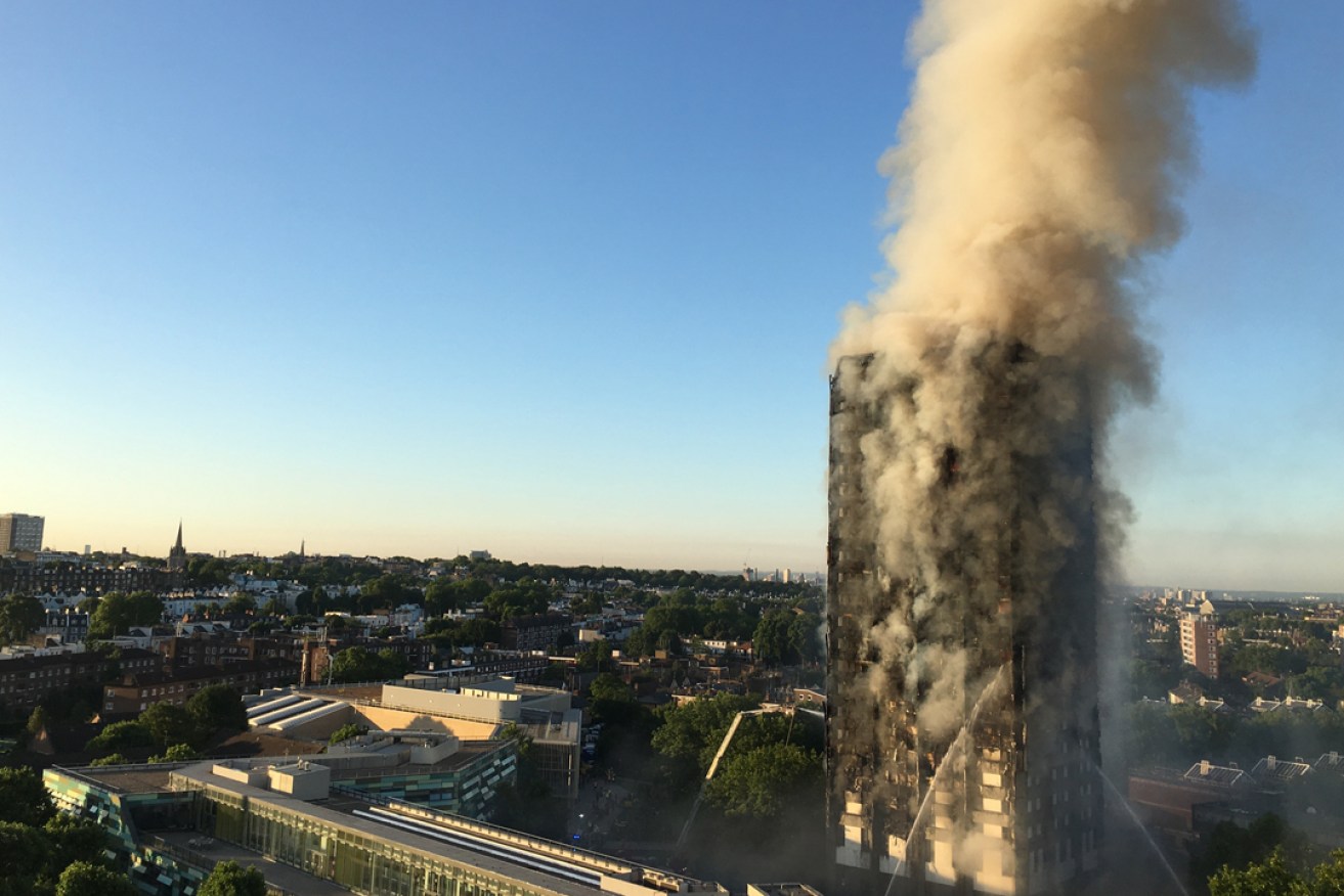 Smoke billows from the fire that engulfed London's 24-storey Grenfell Tower in 2017. Photo: PA