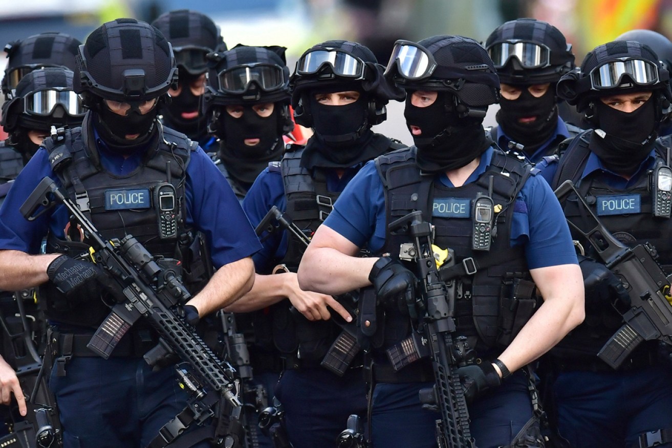 Armed police near the scene of Saturday night's terrorist incidents in London. Photo: PA