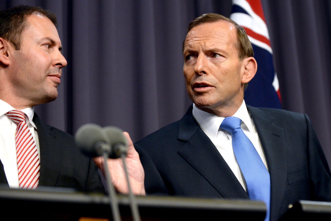 Josh Frydenberg (left) with Tony Abbott during the latter's Prime Ministership in 2014. Photo: AAP/Alan Porritt