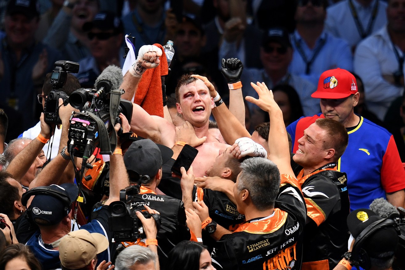 Jeff Horn celebrates defeating Manny Pacquiao in their WBO World Welterweight title fight at Suncorp Stadium in Brisbane. Photo: Dan Peled / AAP