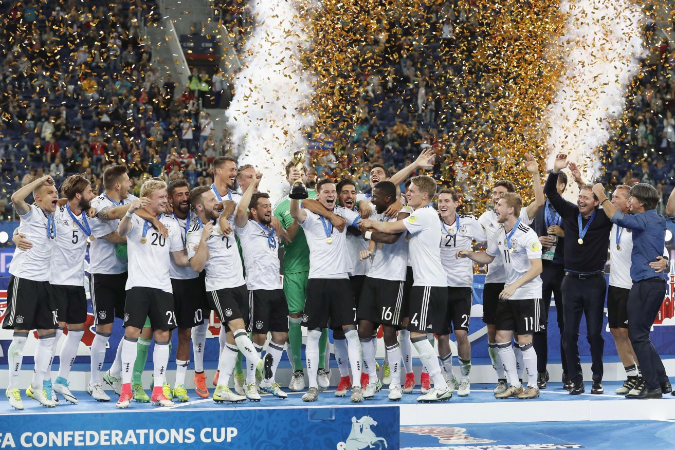 German players celebrate after defeating Chile 1-0 in the Confederations Cup final in St. Petersburg. Photo: Kyodo via AAP