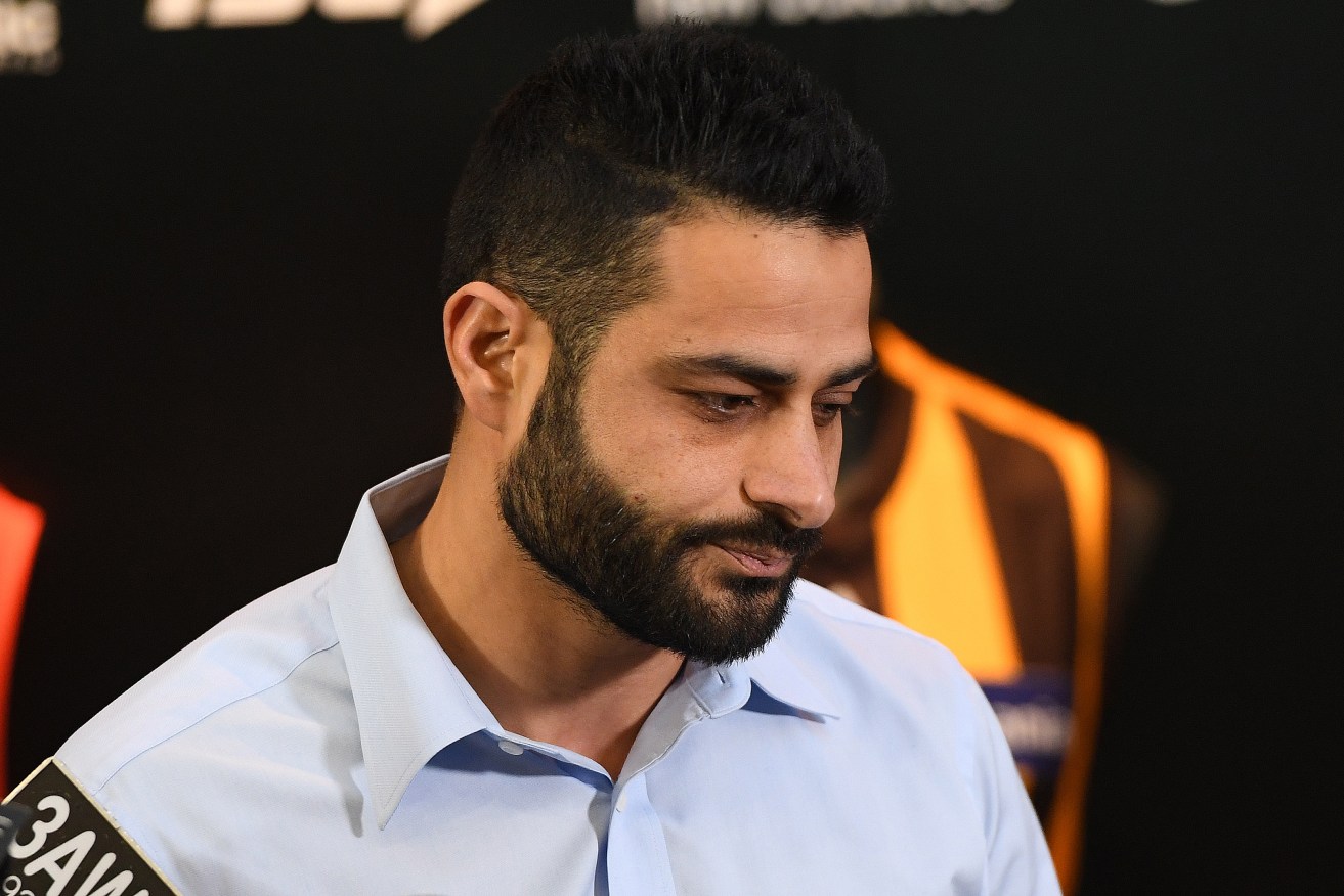 Ali Fahour addresses the media at AFL House this week. Photo: Julian Smith / AAP
