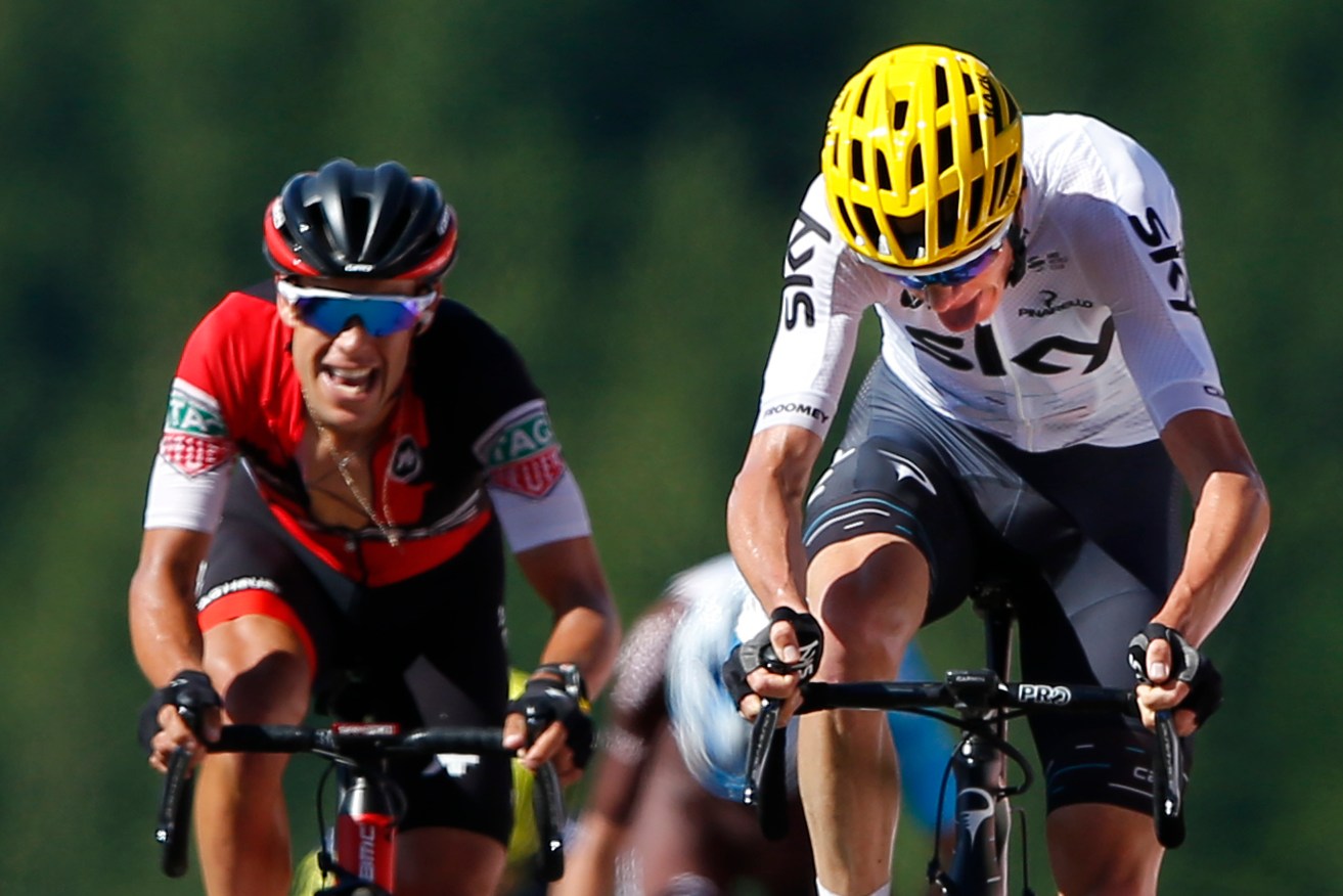 Britain's Chris Froome, the new overall leader, with Australia's Richie Porte in hot pursuit in the last metres of the fifth stage of the Tour de France. Photo: Peter Dejong / AP
