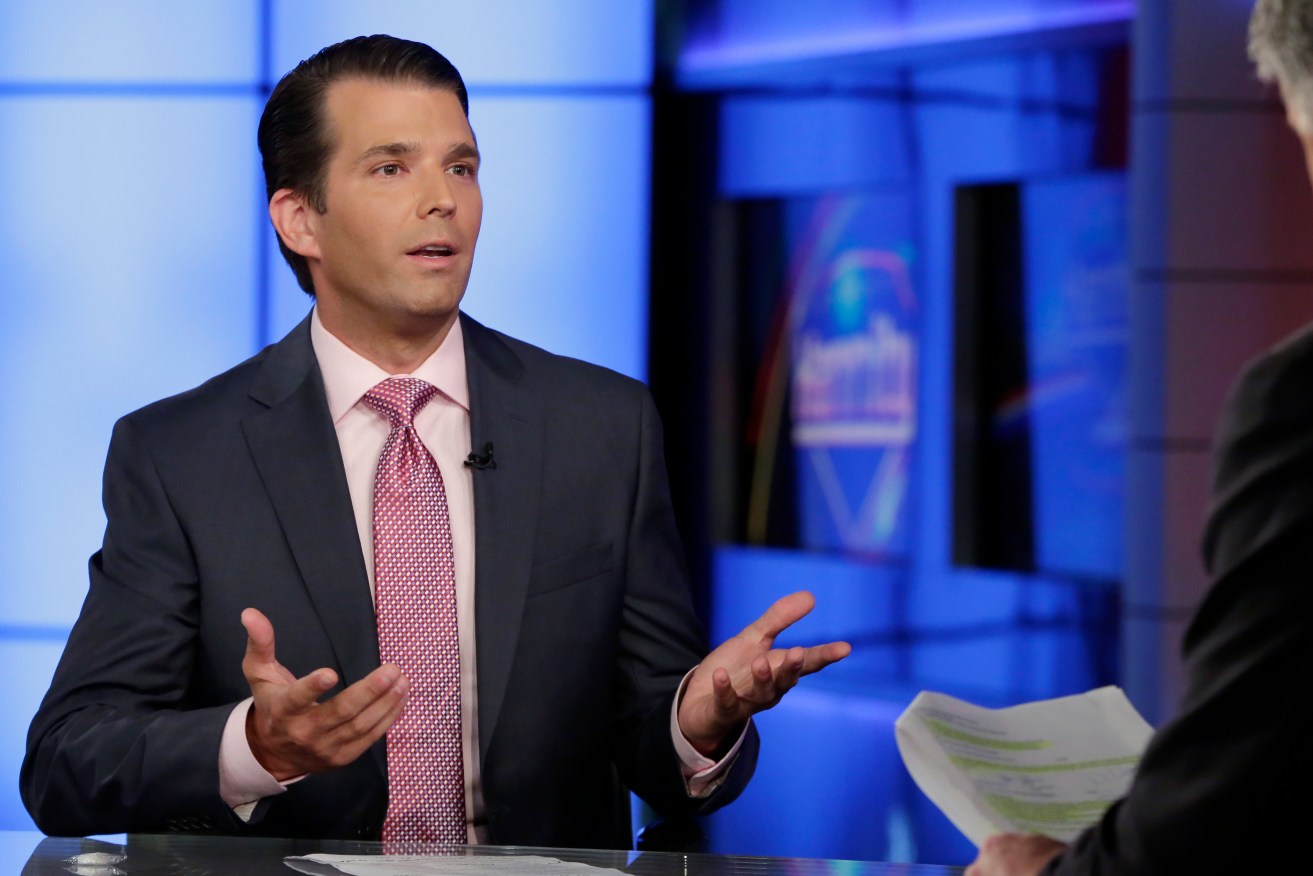 Donald Trump Jr., left, is interviewed by host Sean Hannity on his Fox News Channel television program. Photo: AP/Richard Drew