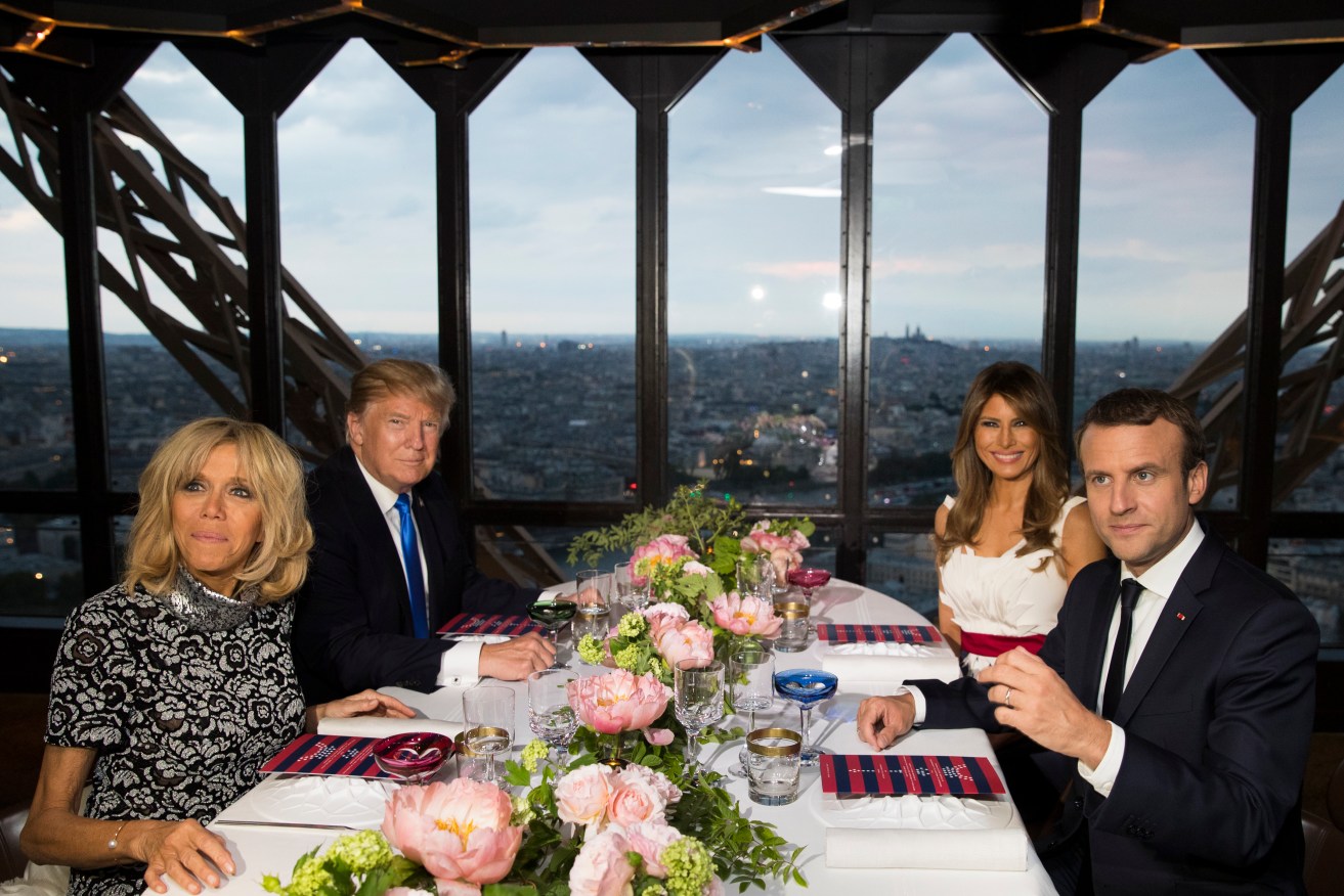 President Donald Trump, first lady Melania Trump, French President Emmanuel Macron, and his wife Brigitte Macron, at the Eiffel Tower's Jules Verne Restaurant. Photo: AP/Carolyn Kaster
