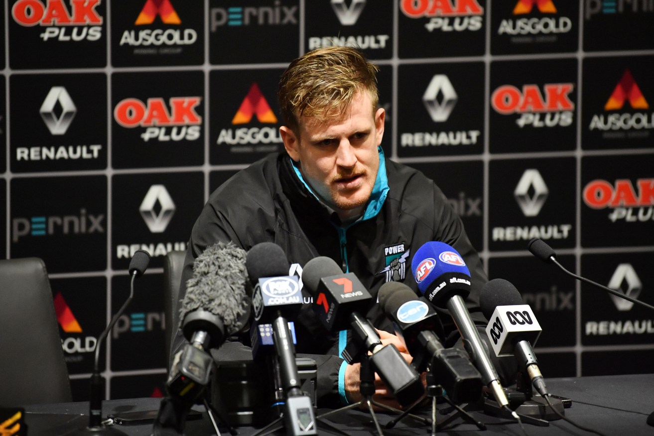 Tom Jonas speaks to media ahead of his 100th AFL game, a must-win against the Saints. Photo: Morgan Sette / AAP