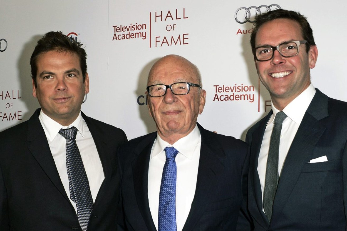 News Corp's Lachlan Murdoch (left) with father Rupert and brother James. Photo: Dan Steinberg/Invision/AP