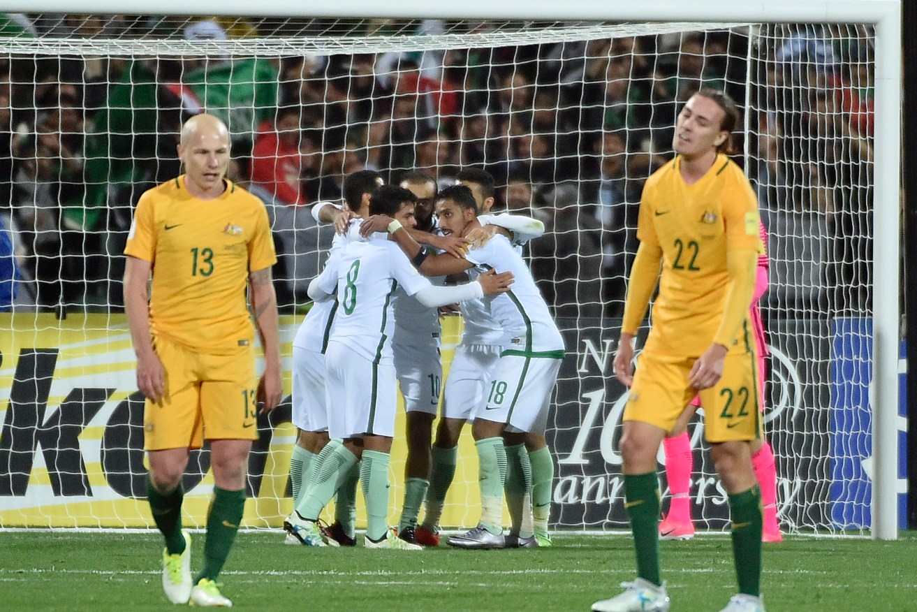 Saudi Arabian players celebrate after scoring during the Adelaide Oval qualifier in June. Photo: AAP/David Mariuz