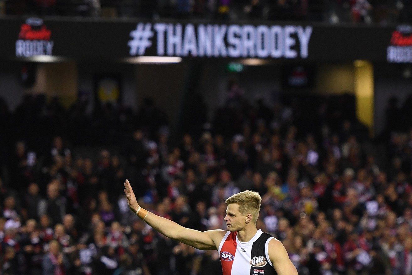 Nick Riewoldt farewells Saints fans in his last home game after yesterday's victory over North Melbourne. Photo: Julian Smith / AAP