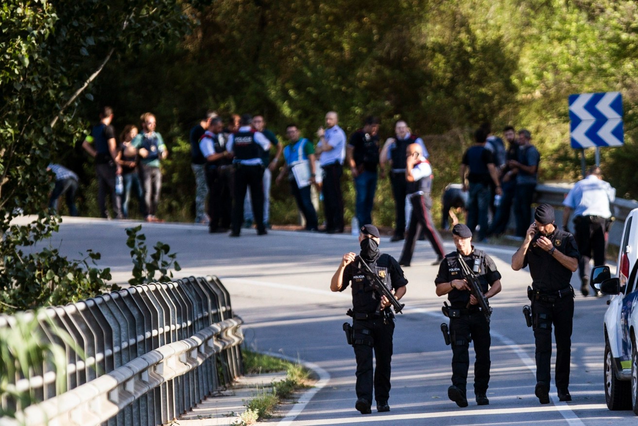 Police in Subirats, near Barcelona, where officers shot dead the man responsible for the Barcelona attack. Photo:  EPA/Quique Garcia