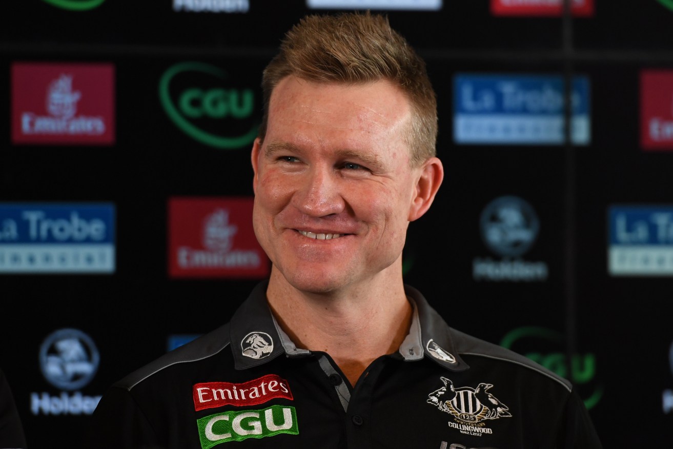 Collingwood coach Nathan Buckley speaks to reporters today. Photo: Julian Smith / AAP
