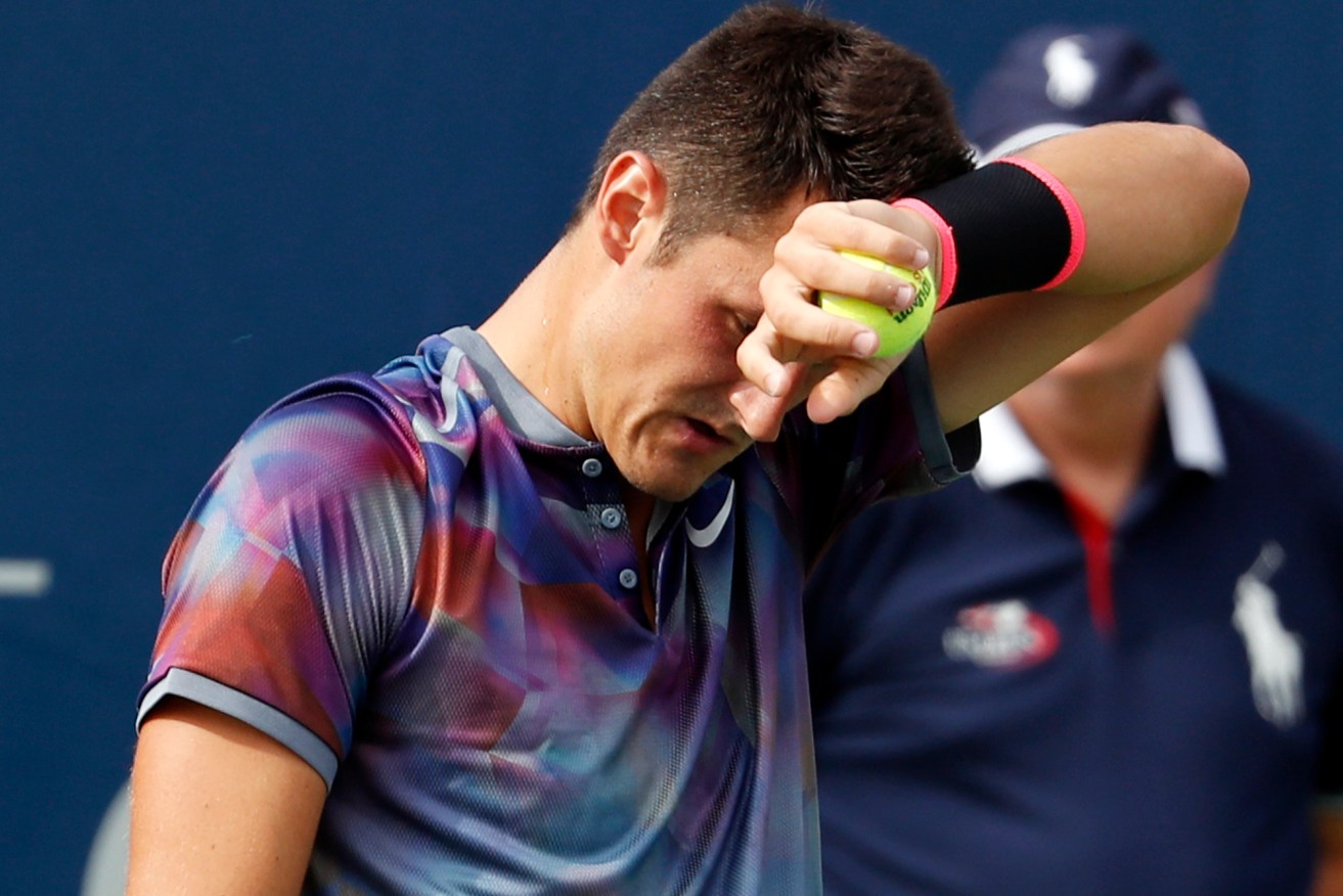 Bernard Tomic serving to Gilles Muller during his first-round US Open loss last month. Photo: Michael Noble / AAP
