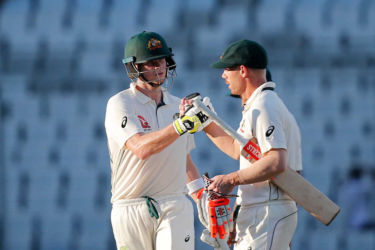 Steve Smith and David Warner at the end of play in Dhaka yesterday. Photo: A.M. Ahad / AP