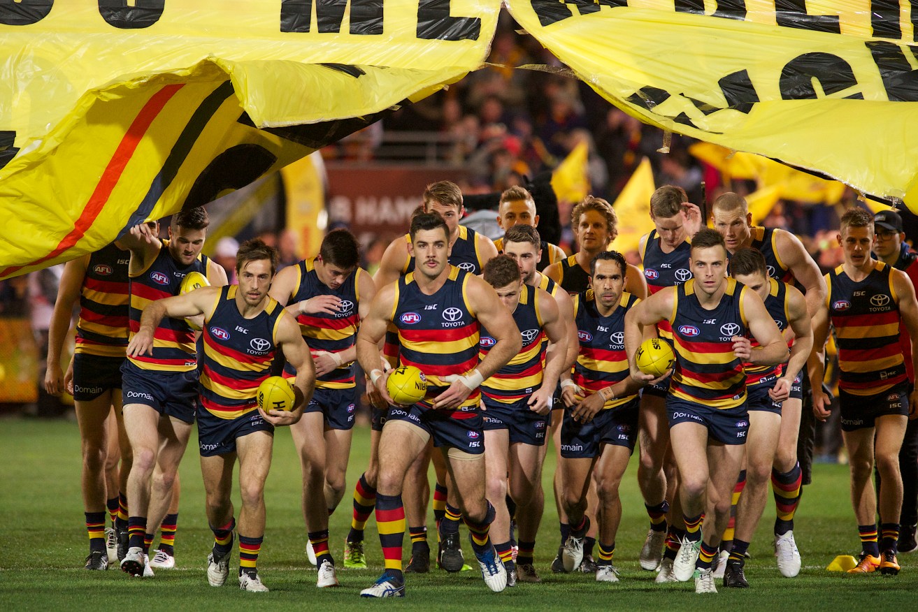 Tex didn't do a great deal on the night, but he definitely nailed the 'Menacing Game Face While Running Through The Banner'. Photo: Michael Errey / InDaily