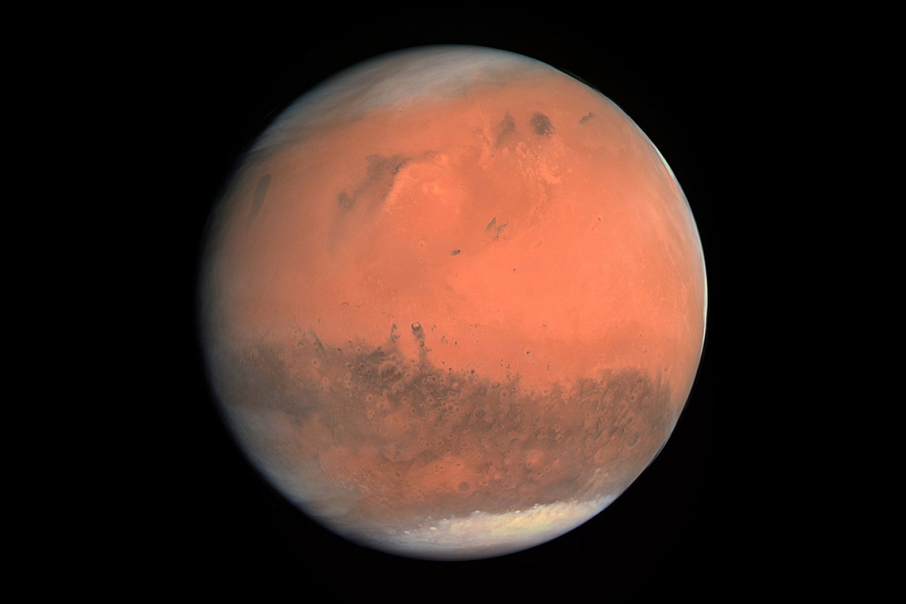 A true color image of Mars taken by the OSIRIS instrument on the ESA Rosetta spacecraft during its February 2007 flyby of the planet. Photo: European Space Agency/Wikipedia