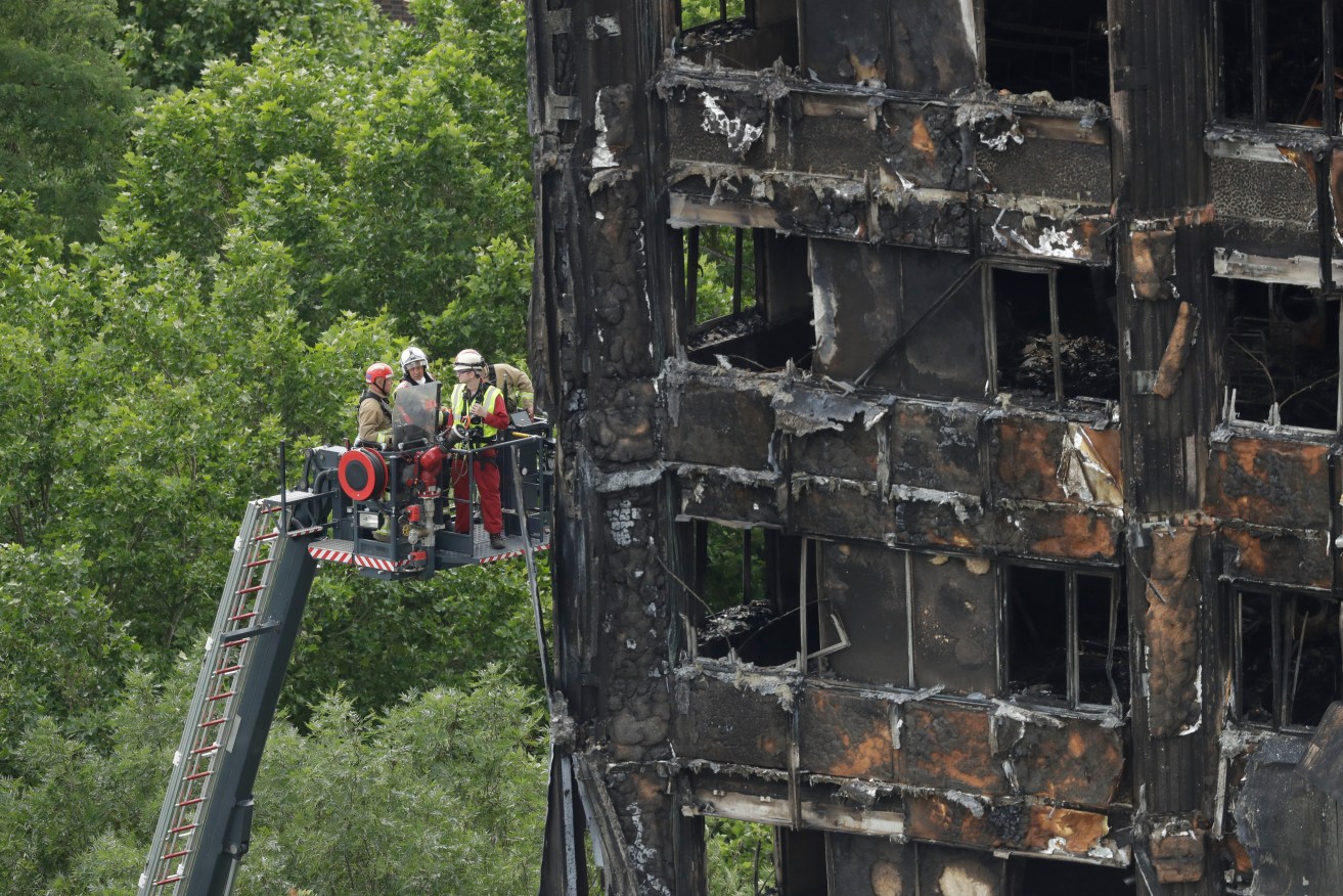 London's deadly Grenfell Tower fire has prompted a renewed sense of urgency about the use of cladding in Australia. Photo: Matt Dunham / AP