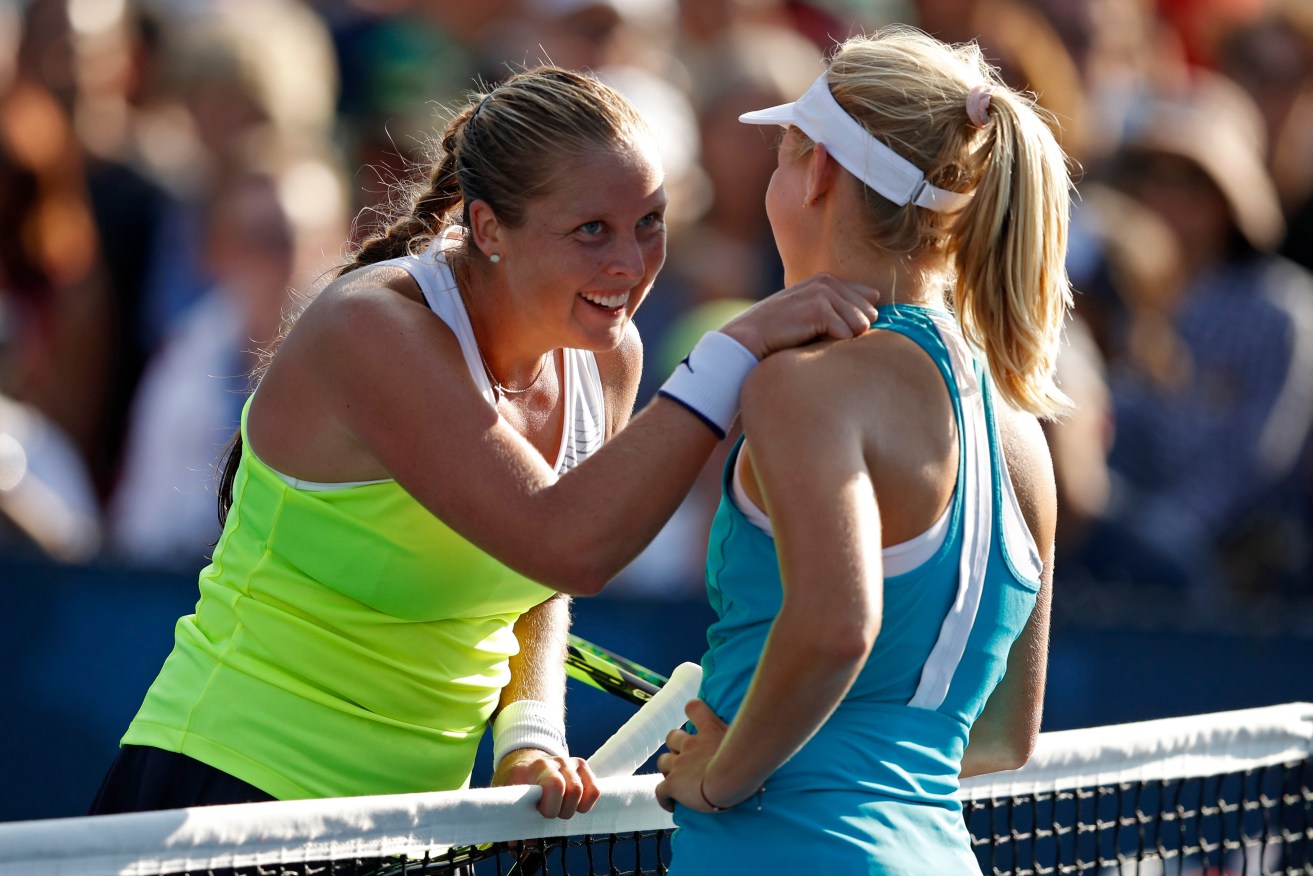 Shelby Rogers consoles Daria Gavrilova after their second round match. Photo: Adam Hunger / AP