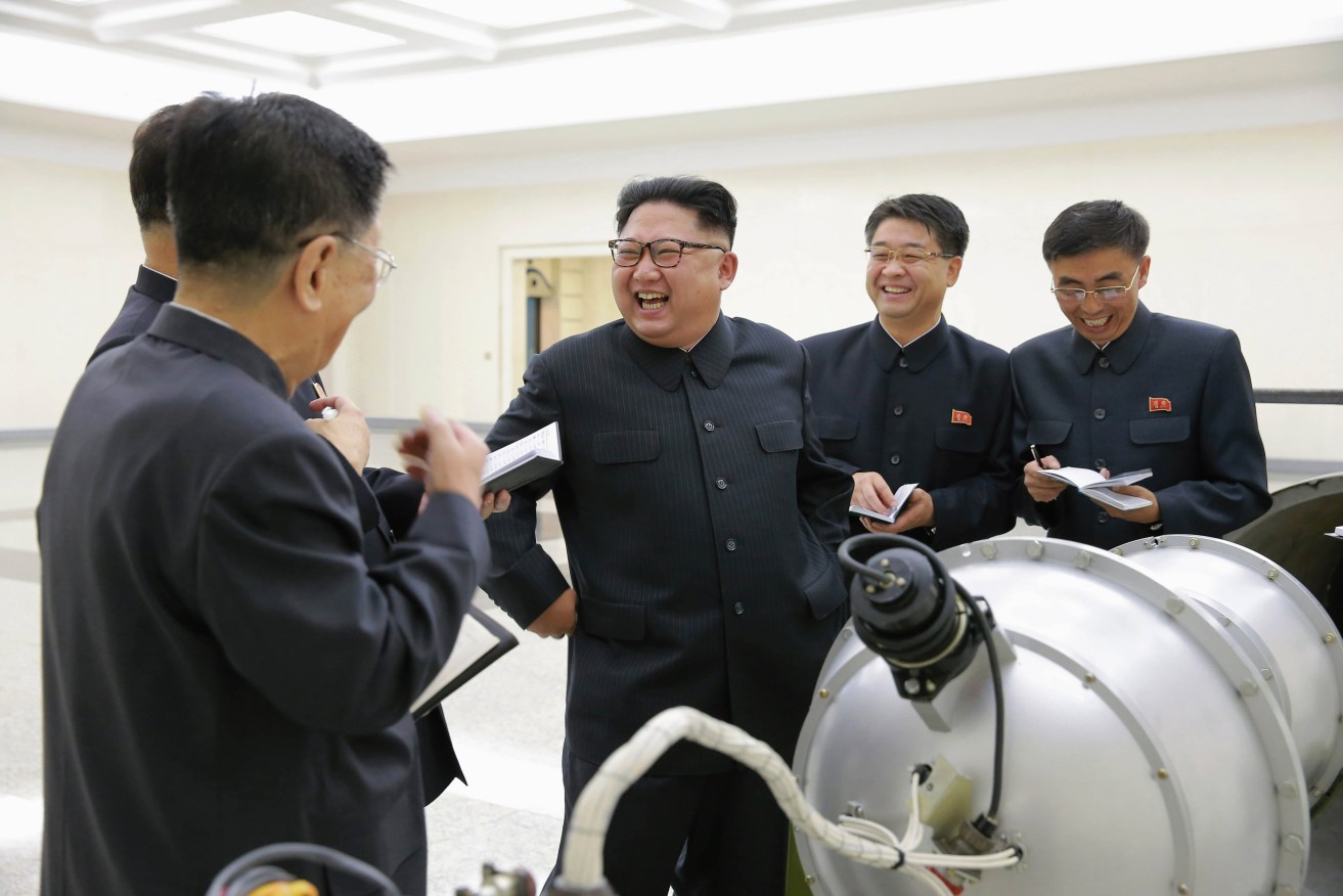An undated photo released by the North Korean state news agency  purports to show Kim Jong-un (third from right) guiding the work for nuclear weaponization. Photo: EPA/KCNA
