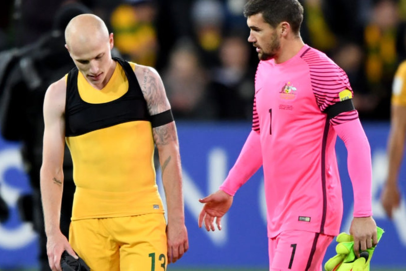 Aaron Mooy and Mathew Ryan after Australia's hollow victory over Thailand this month. Photo: Joe Castro / AAP