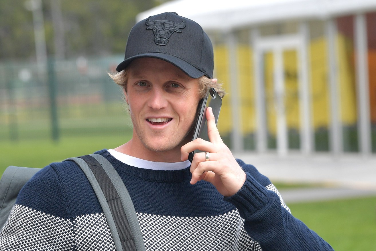 EARLY CALL: Rory Sloane arrives at an Adelaide Oval training session yesterday. Photo: David Mariuz / AAP
