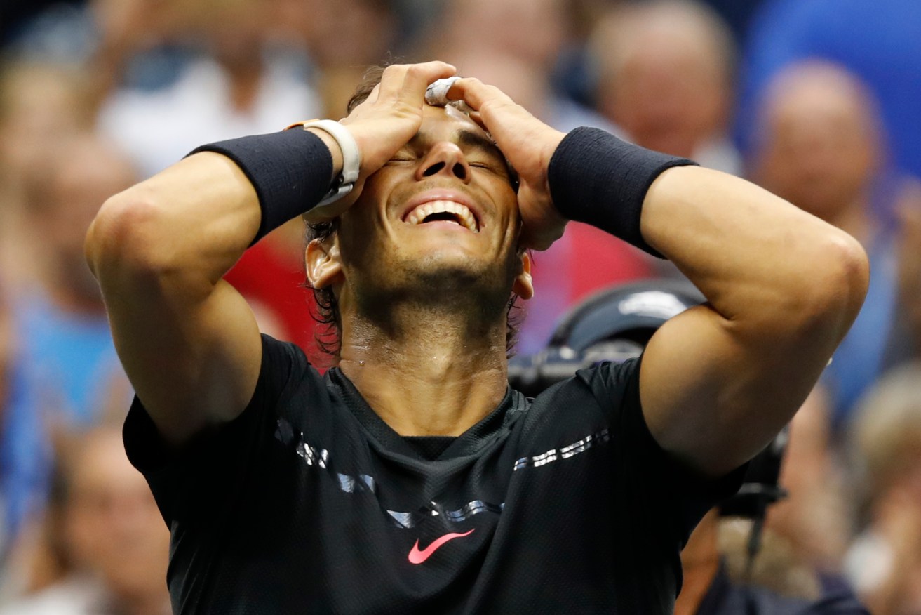 Rafael Nadal reacts after beating Kevin Anderson to win the US Open men's singles final this morning. Photo: Adam Hunger / AP