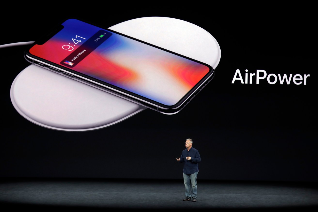 Phil Schiller, Apple's senior vice president of worldwide marketing, discusses features of the new AirPower product at the Steve Jobs Theater in Cupertino. Photo: AP/Marcio Jose Sanchez