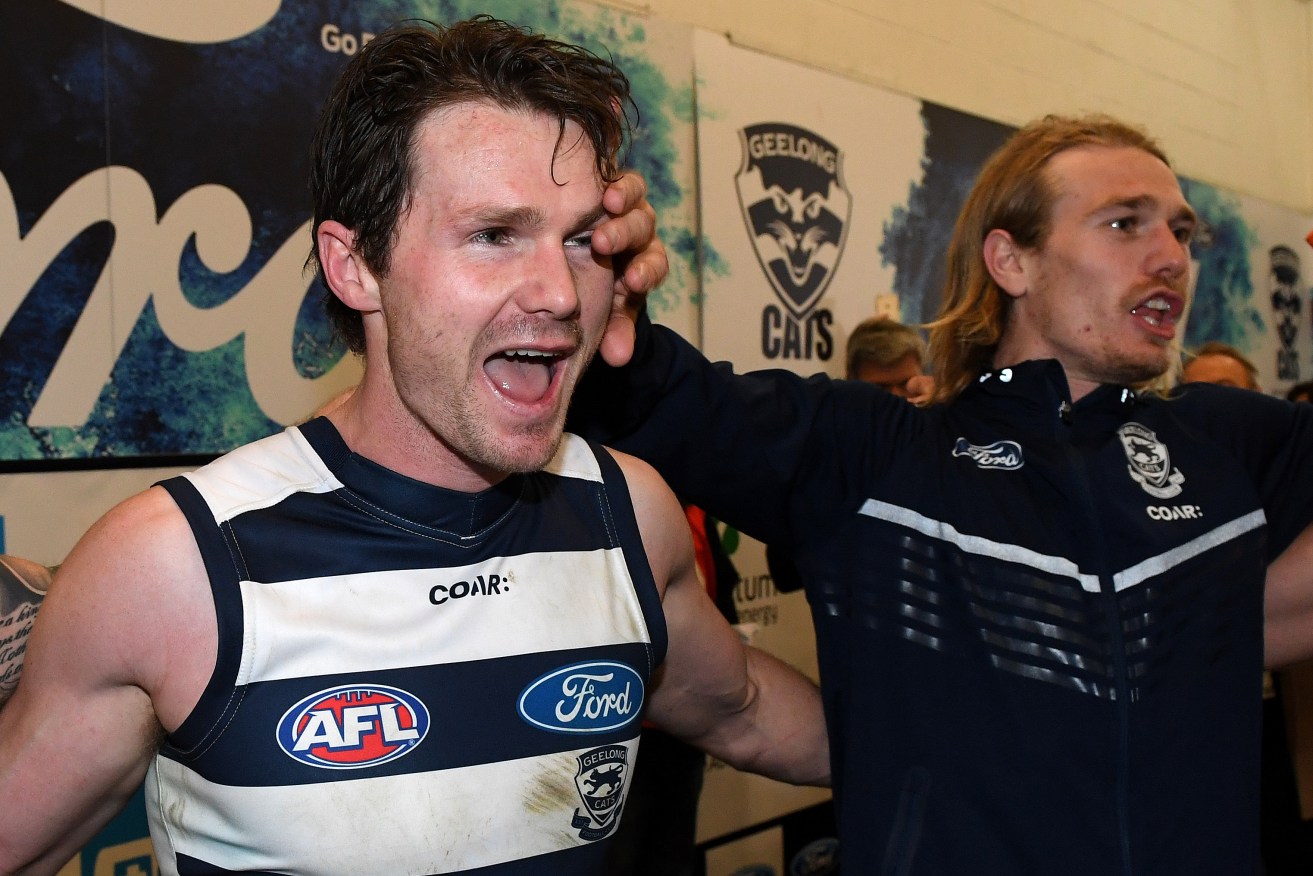 JOKER? Tom Stewart spreads the love to former Crow Patrick Dangerfield after Friday night's semi-final win over the Swans. Photo: Julian Smith / AAP