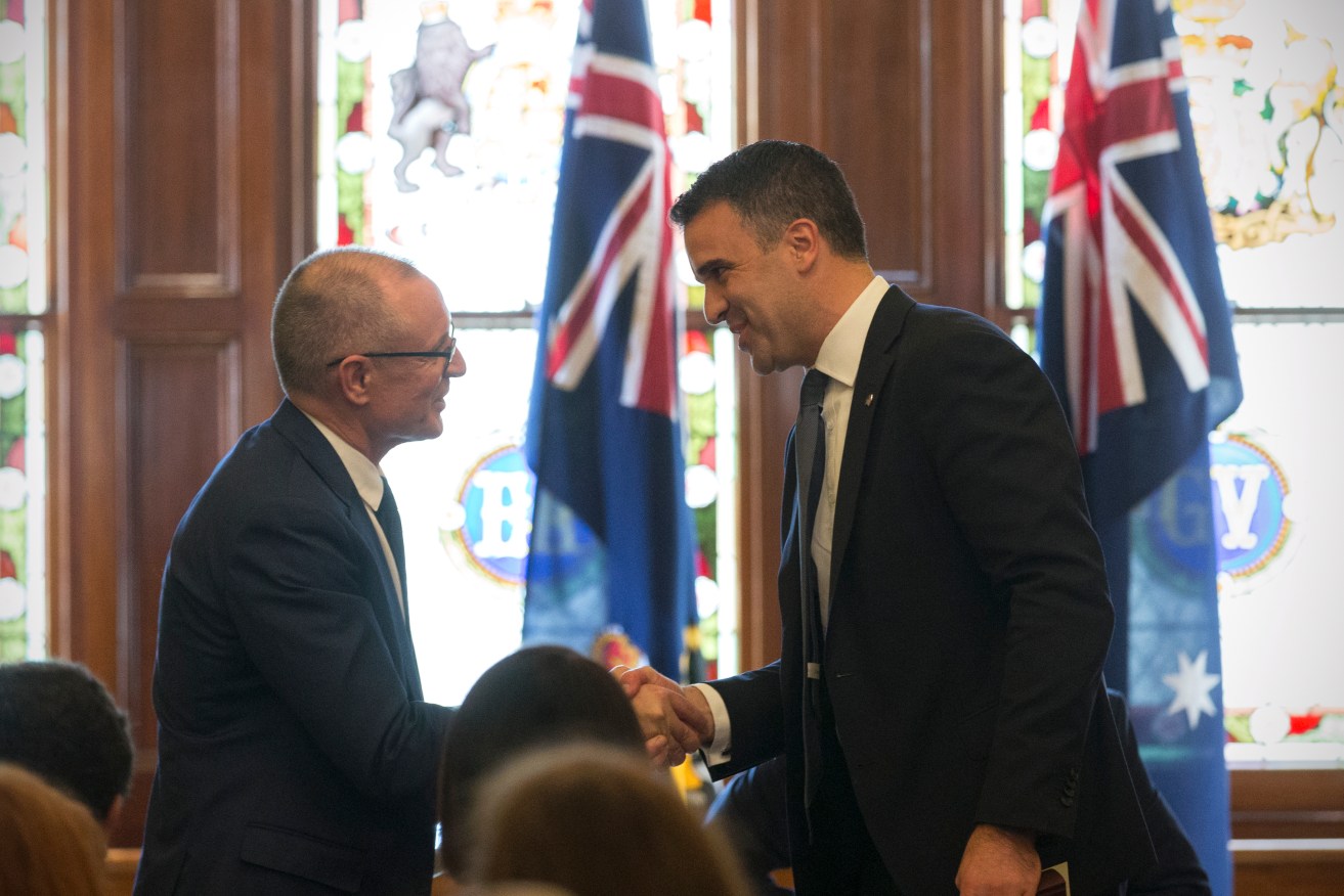 Jay Weatherill welcomes Peter Malinauskas to his new role as Health Minister this week. Photo: Ben Macmahon / AAP