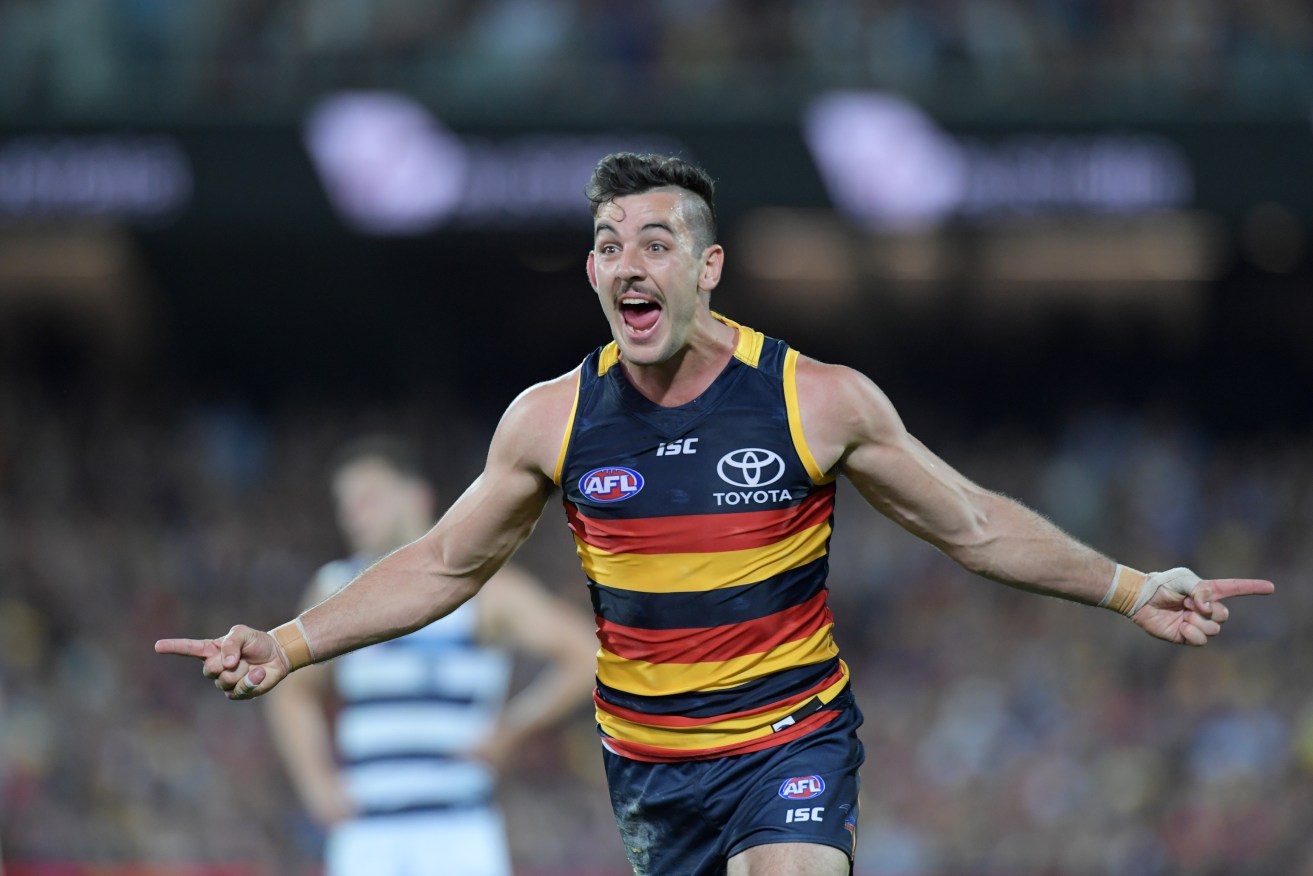 Taylor Walker expects plenty of support in enemy territory for Adelaide's big day. Photo: Tracey Nearmy / AAP