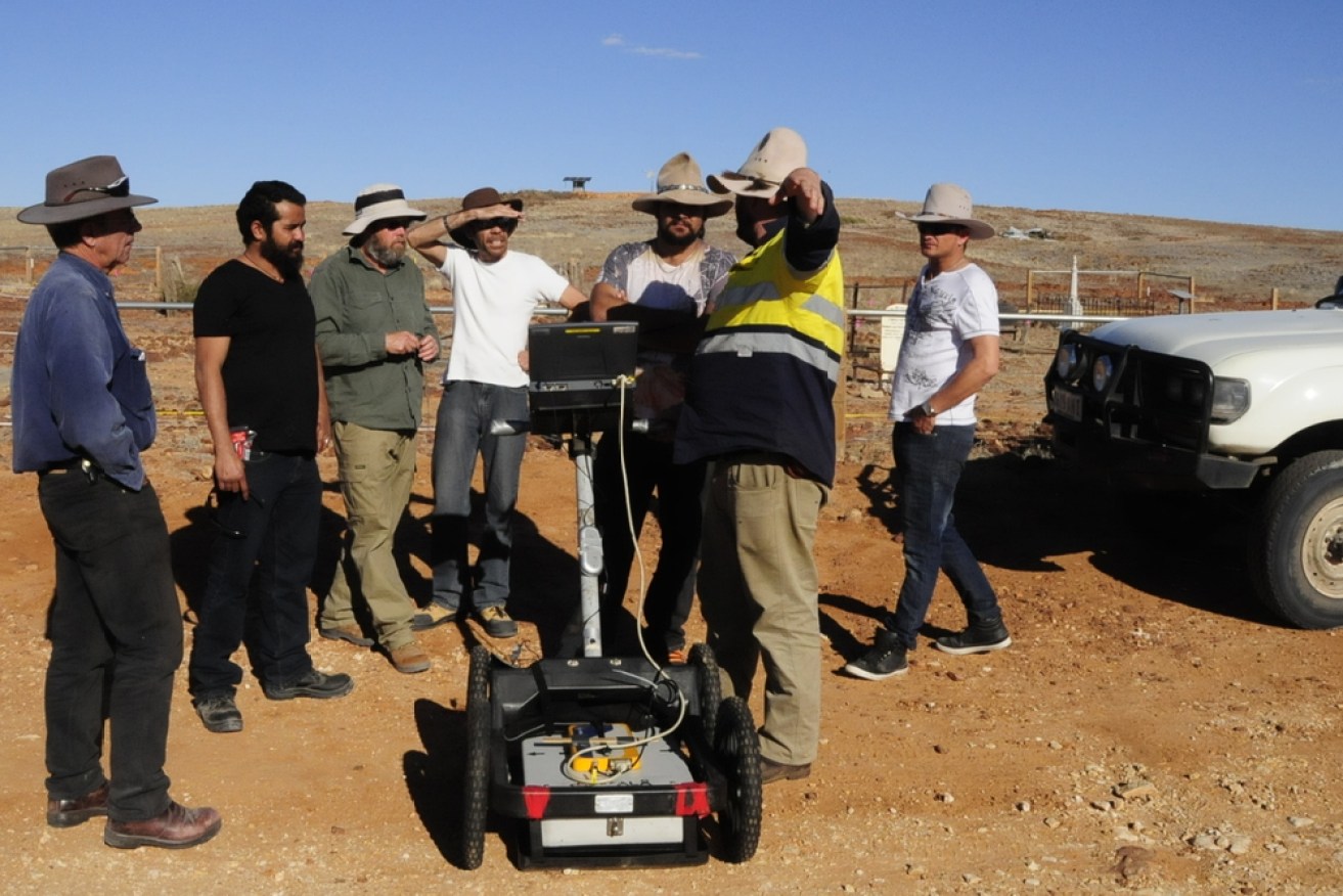Pilot study on why academics should engage with others in the community
May 9, 2017 5.42am AEST
Dr Ian Moffat explaining ground penetrating radar to community members during a survey of the Innamincka Cemetery.