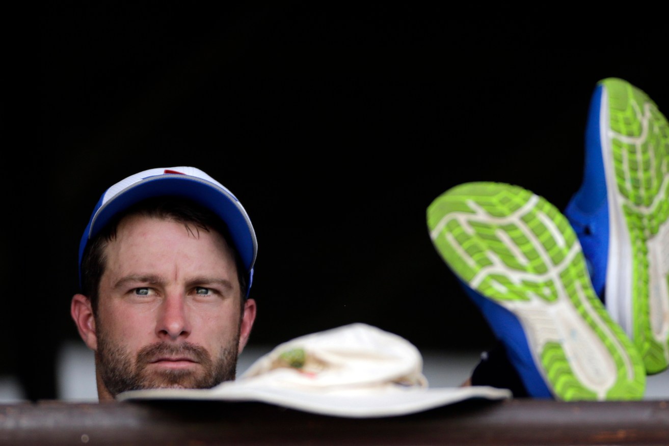 Matthew Wade rests during a practice session in Nagpur during last month's tour of India. Photo: Rajanish Kakade / AP