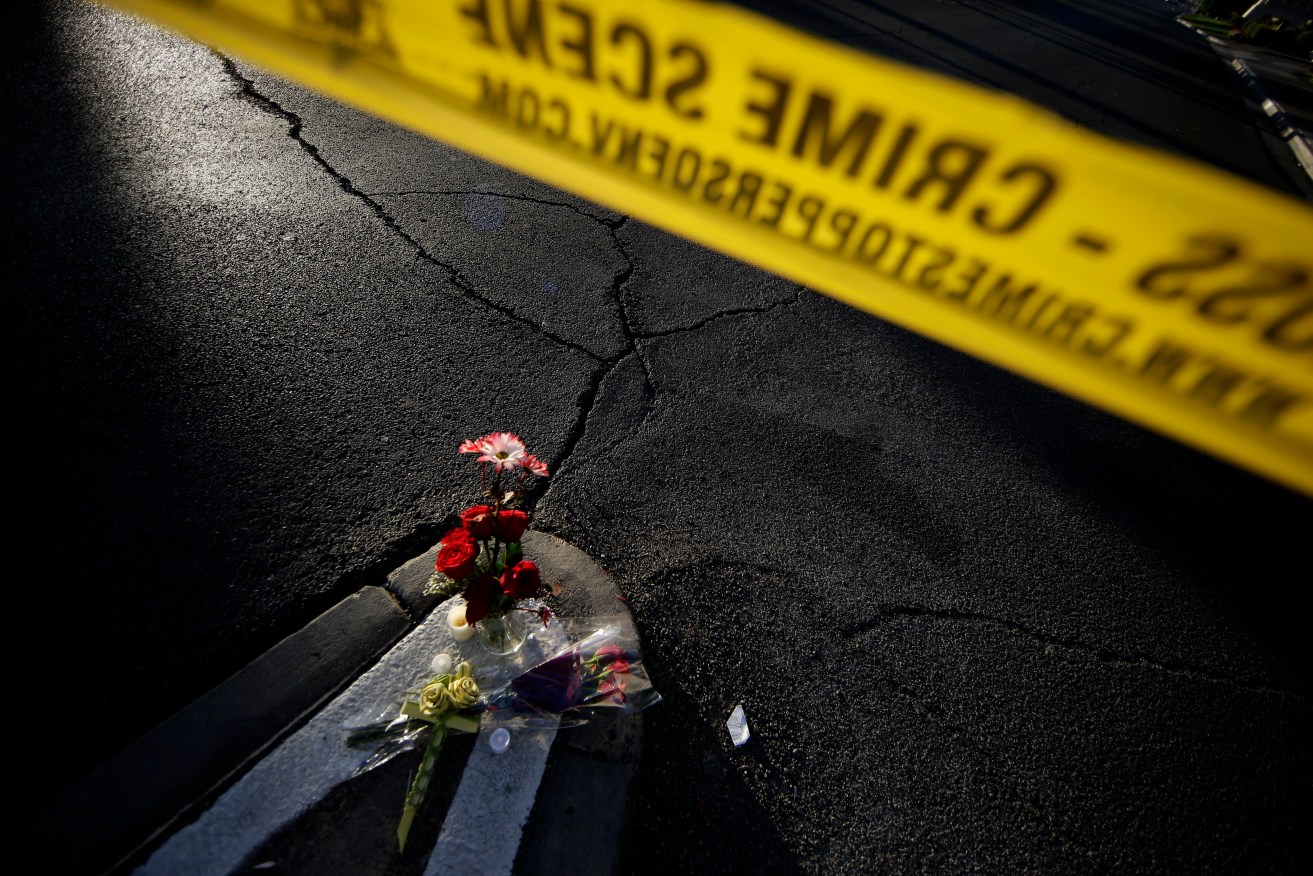 A small memorial on Las Vegas Boulevard in front of the Mandalay Bay Hotel and Casino. Photo: EPA/Paul Buck