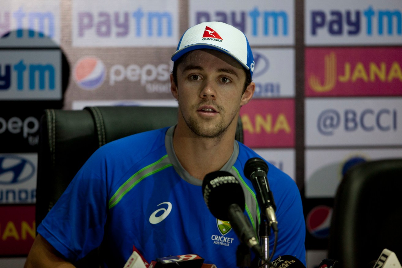 Travis Head addresses the media in India this month. Photo: AP / Mahesh Kumar A.
