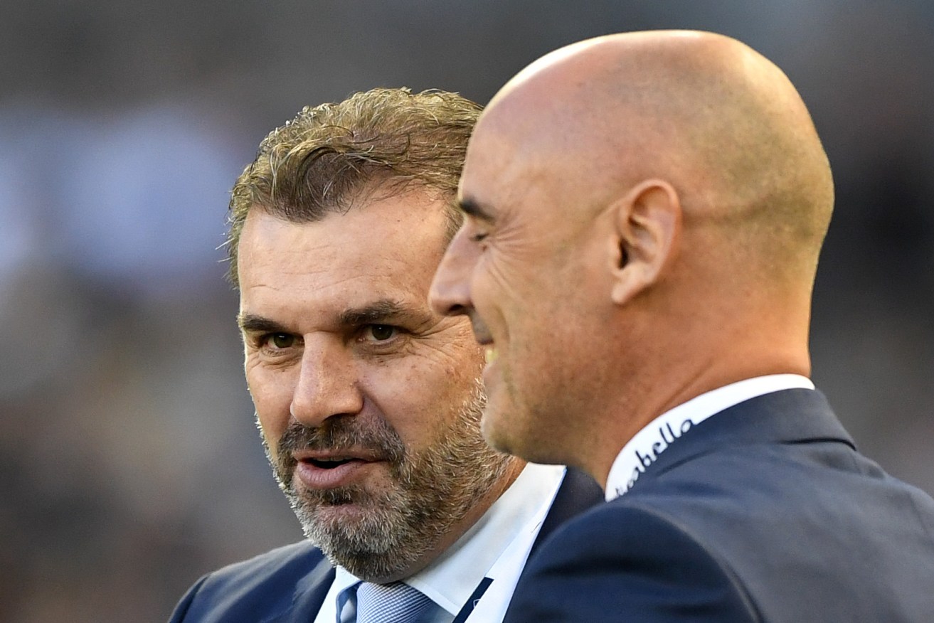 Ange Postecoglou has a laugh with Melbourne Victory coach Kevin Muscat before his team's weekend A-League match. Photo: Joe Castro / AAP