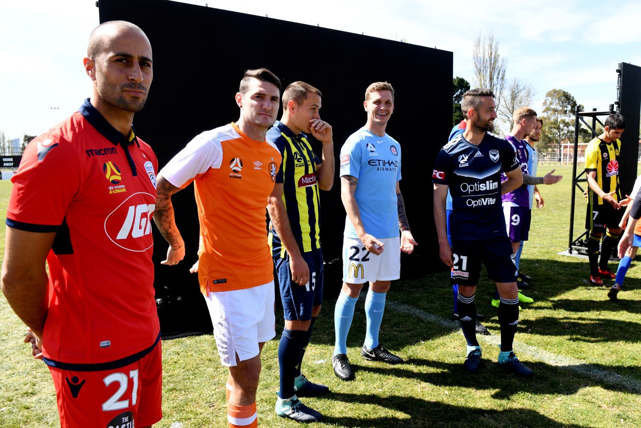 A-League players, including Adelaide's Tarek Elrich, at last month's official launch of the A-League season. Photo: Tracey Nearmy / AAP