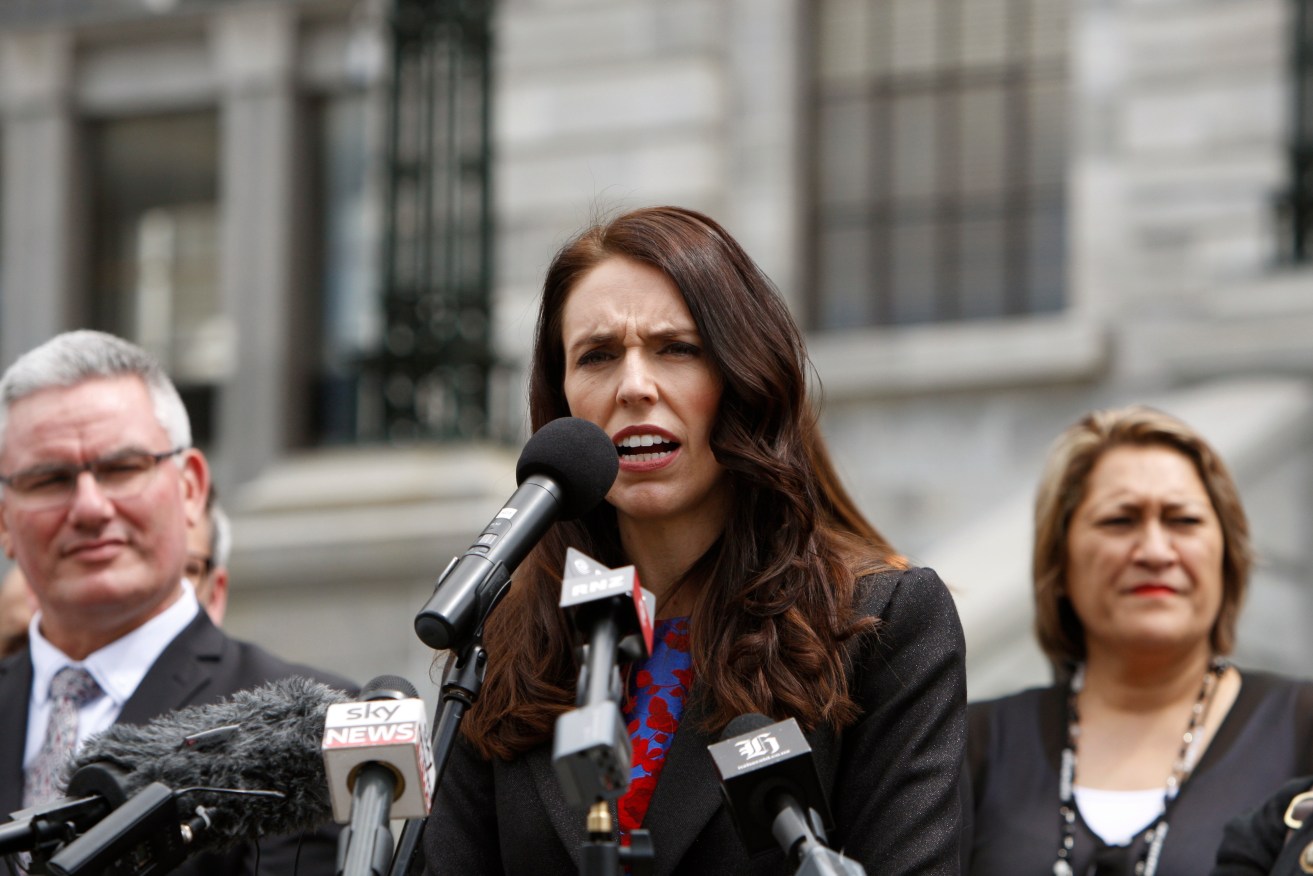 New Zealand Prime Minister Jacinda Ardern (centre) will raise the Manus Island situation with Malcolm Turnbull on Sunday.  Photo: AP/Nick Perry