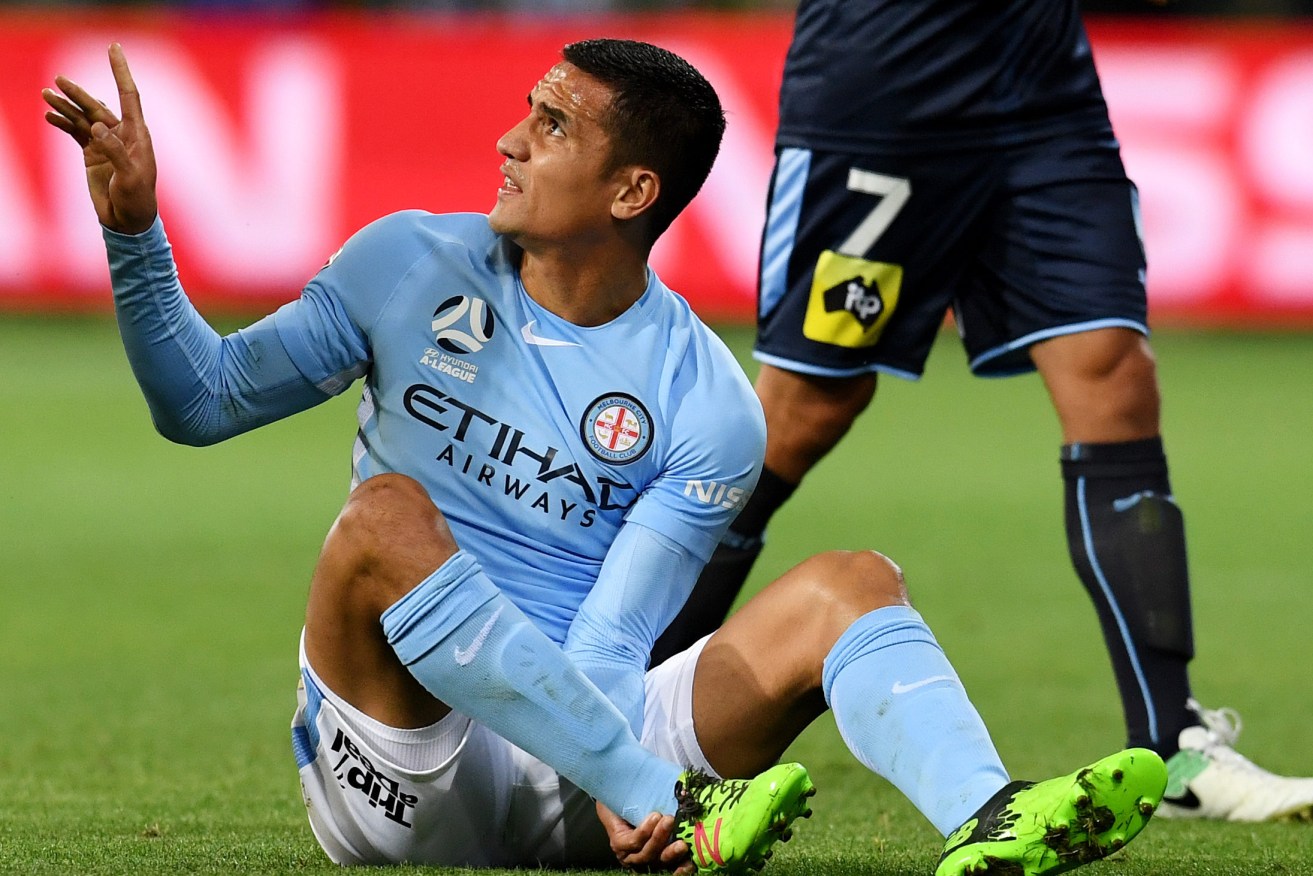 Tim Cahill injured his ankle playing for Melbourne City on Friday - but has since departed for Honduras. Photo: Tracey Nearmy / AAP