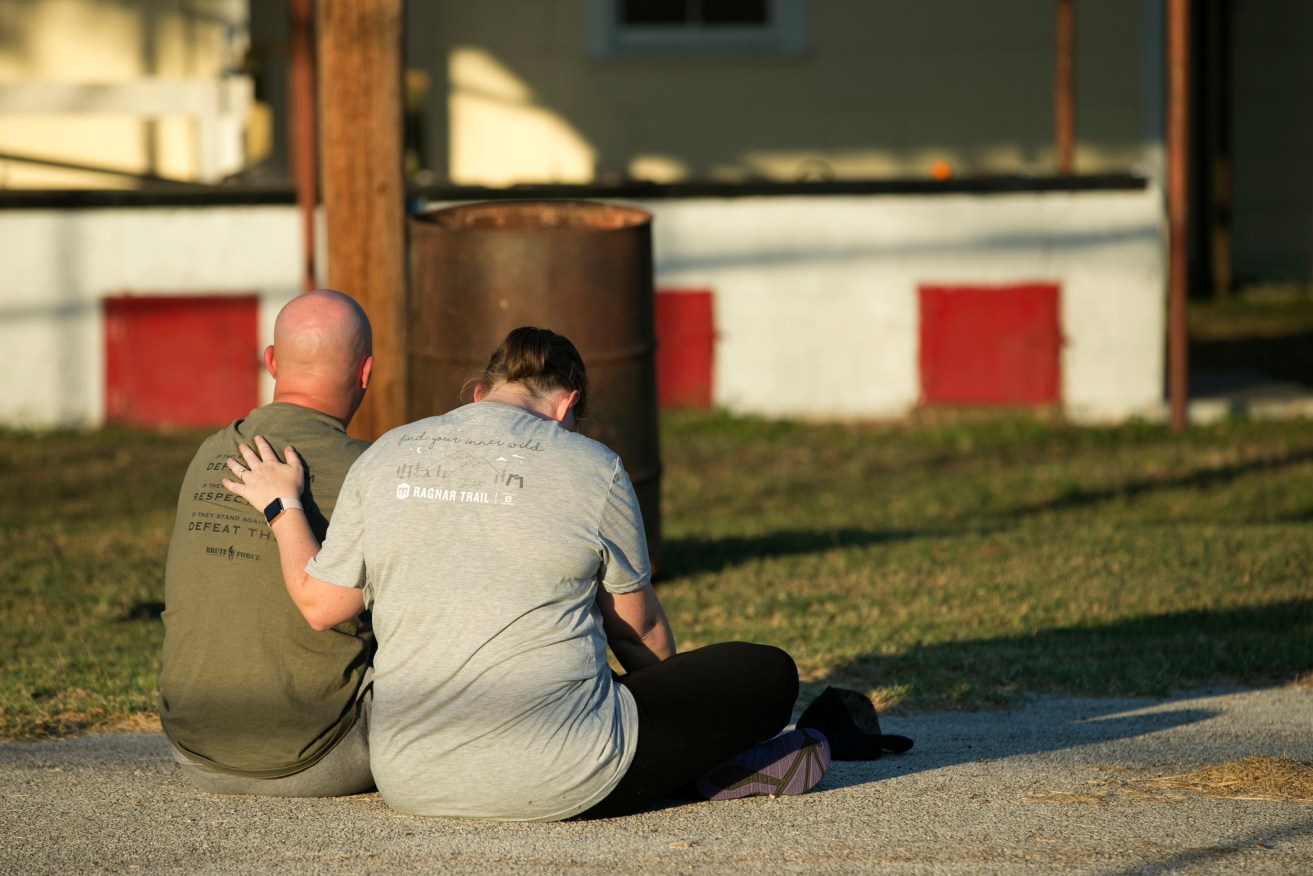 A couple comfort each other at a community center in Sutherland Springs, Texas, near the scene of a mass shooting at the First Baptist Church. Photo: Jay Janner/Austin American-Statesman via AP