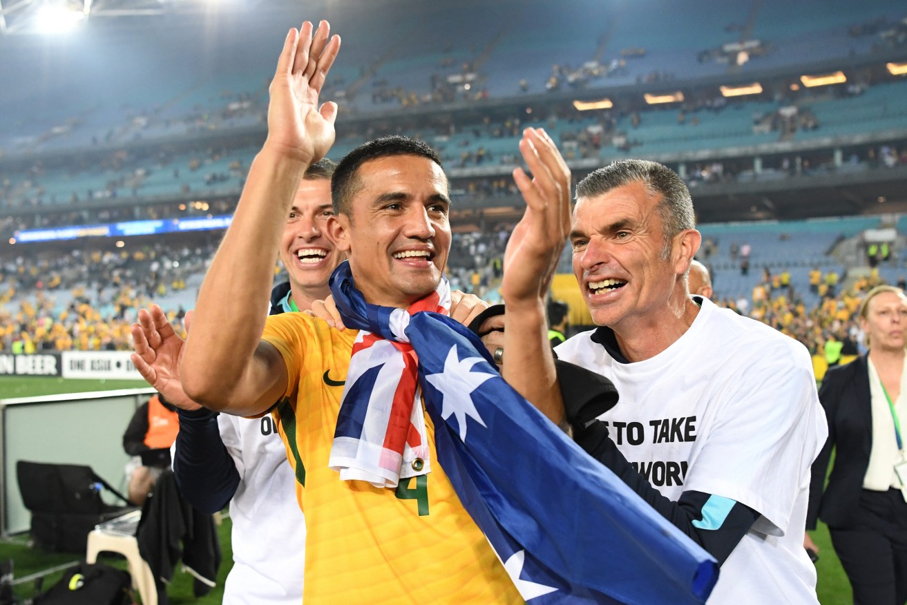 Tim Cahill celebrates after last night's win. Photo: David Moir / AAP