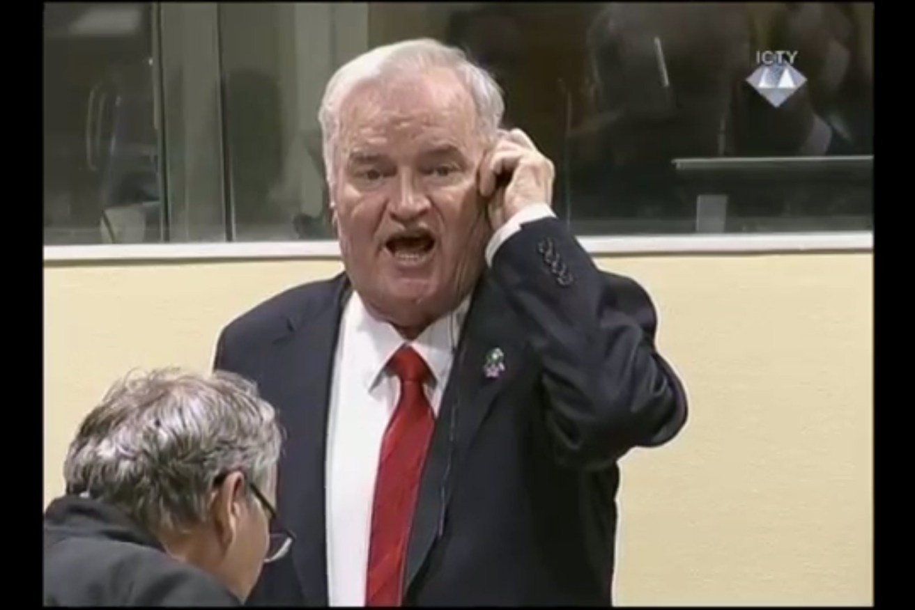 Former Bosnian Serb military chief Ratko Mladic shouts at the presiding judge during the verdict hearing in his genocide trial. Photo: EPA/ICTY TV