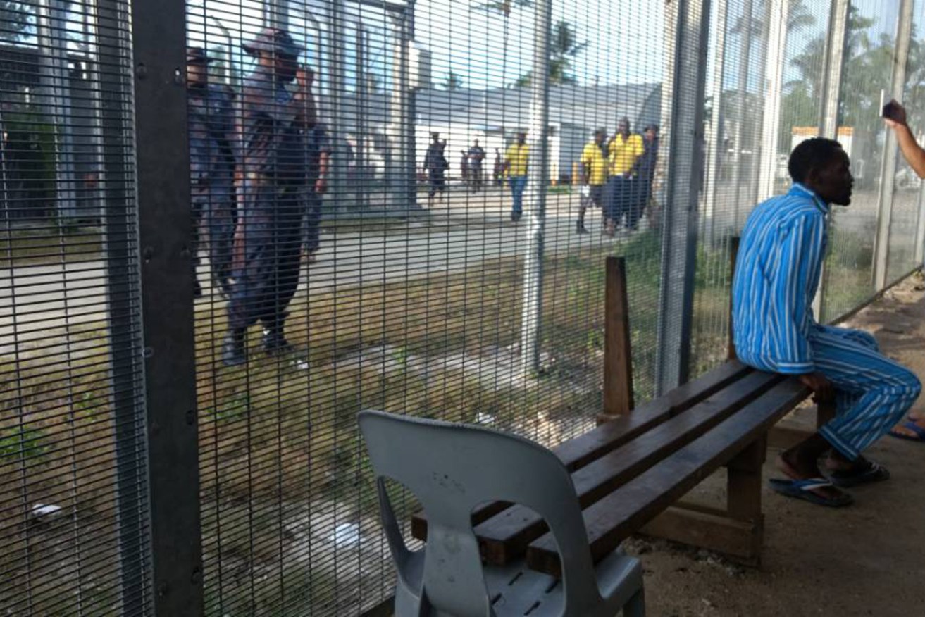 PNG police enter the Manus Island detention centre. Photo: AAP/Supplied by Manus detainee