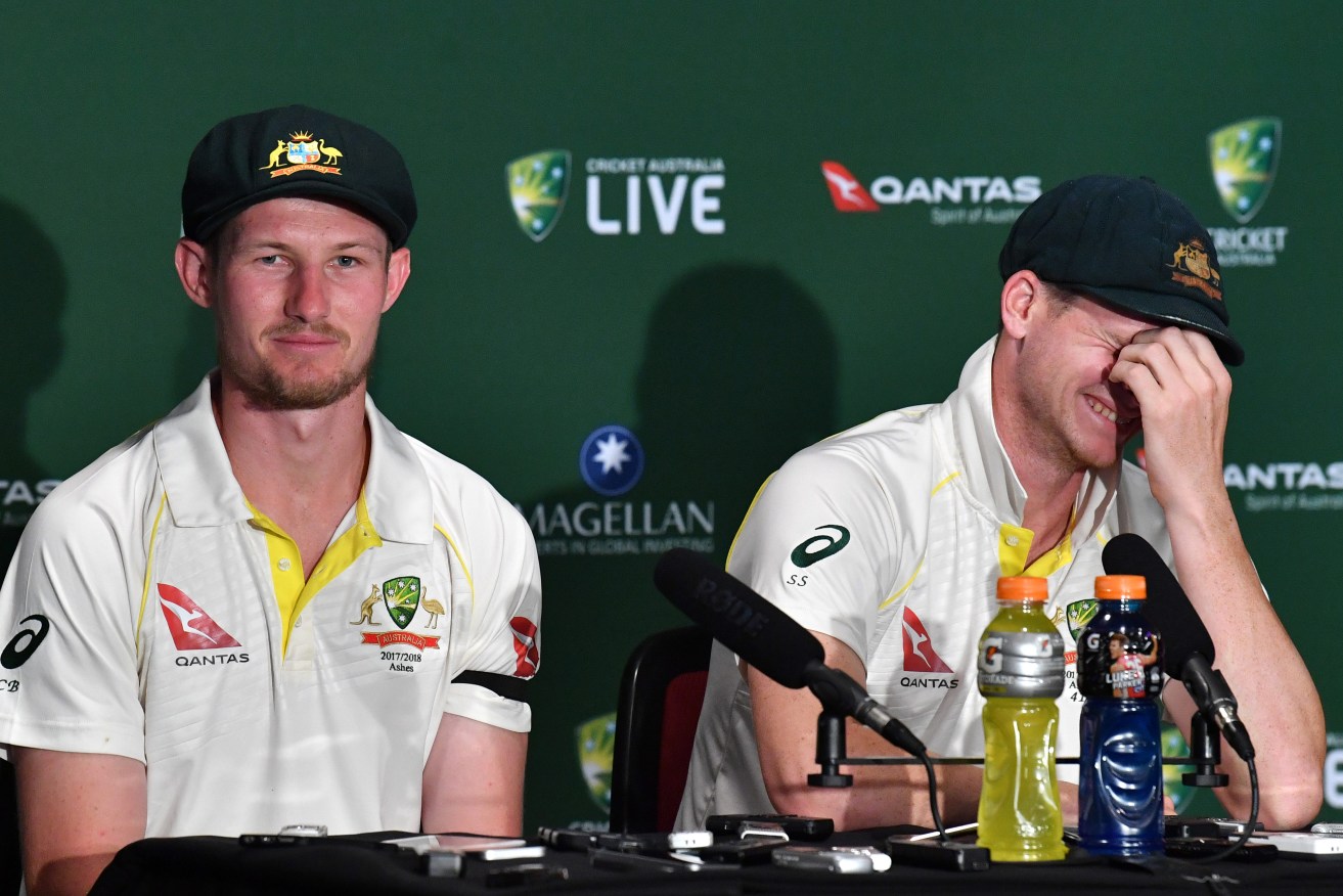WINNERS GRINNING: Cameron Bancroft kept Steve Smith amused after yesterday's win, but the skipper says Australia's selection decisions were vindicated. Photo: Darren England / AAP