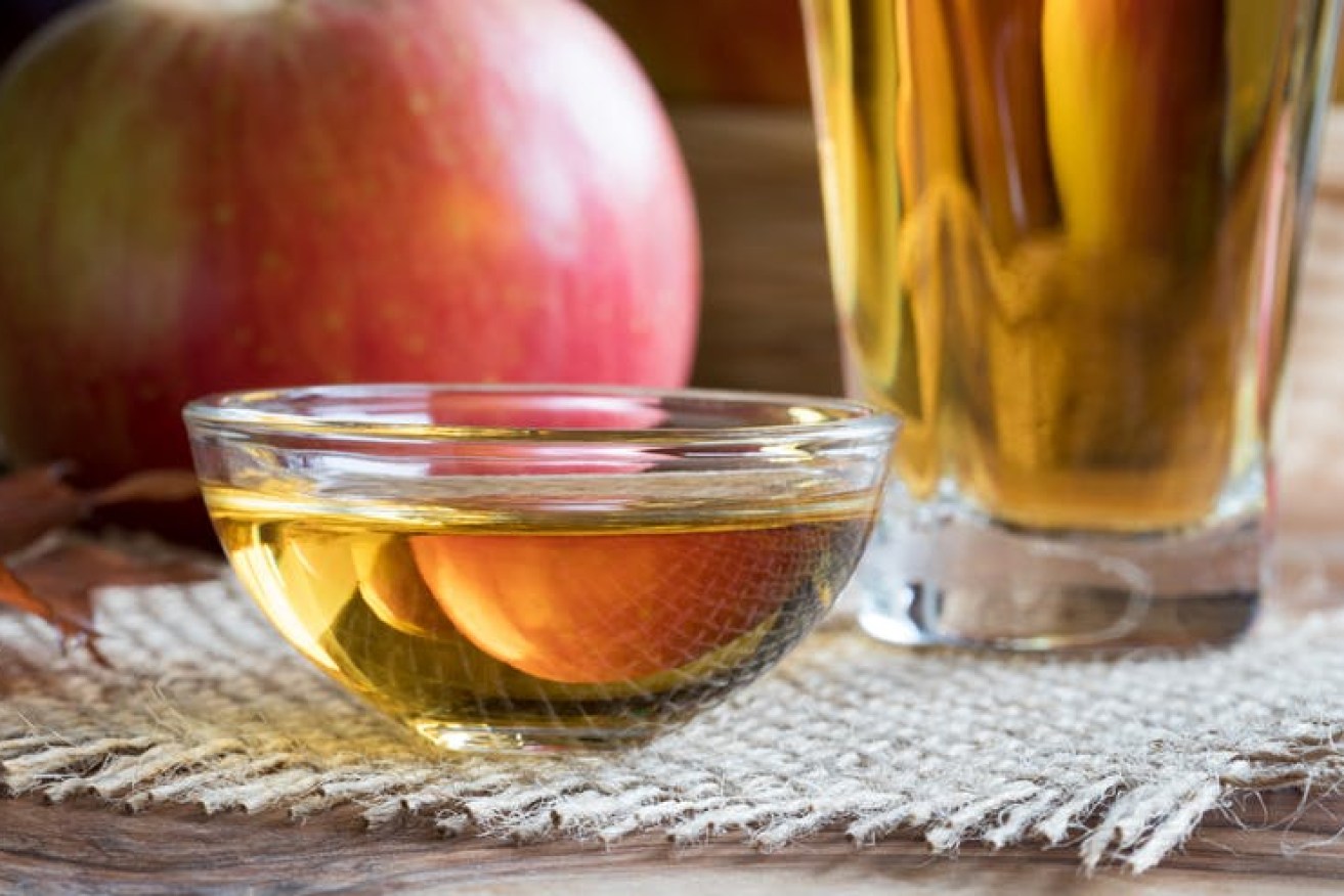 Apple cider vinegar makes a tasty dressing, but the health claims are overblown. Photo: Madeleine Steinbach/Shutterstock