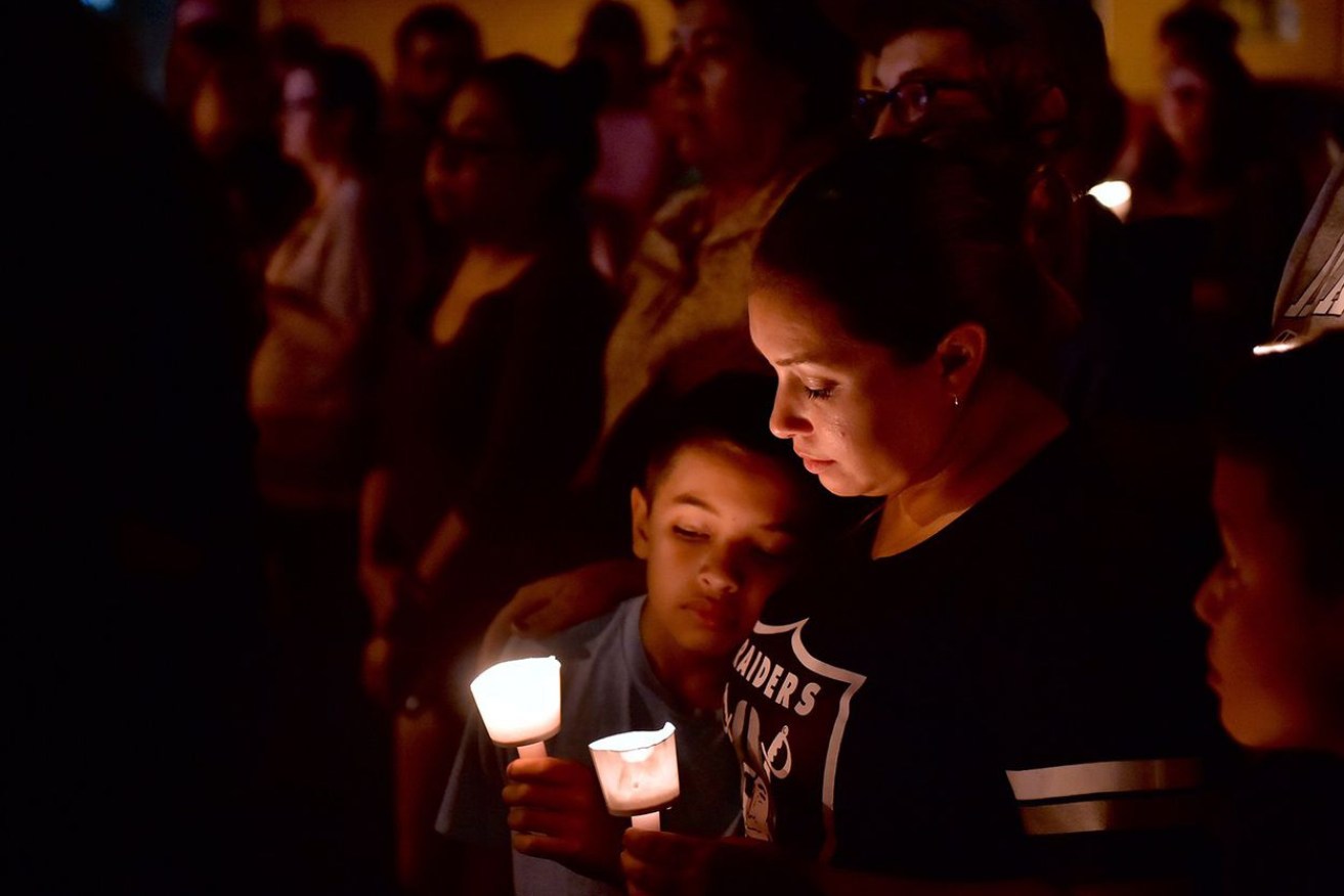 Mourners gathered for the victims of the First Baptist Church shooting at a candlelight vigil in Sutherland Springs on Sunday night, Nov. 5, 2017. Photo: Robin Jerstad for The Texas Tribune