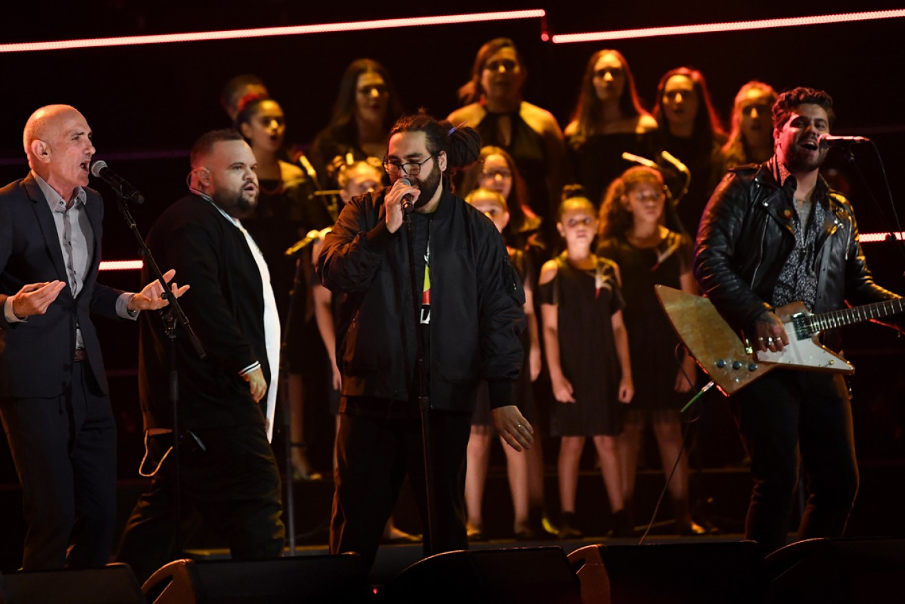 Paul Kelly performs with AB Original and Dan Sultan at the ARIAs ceremony. Photo: AAP