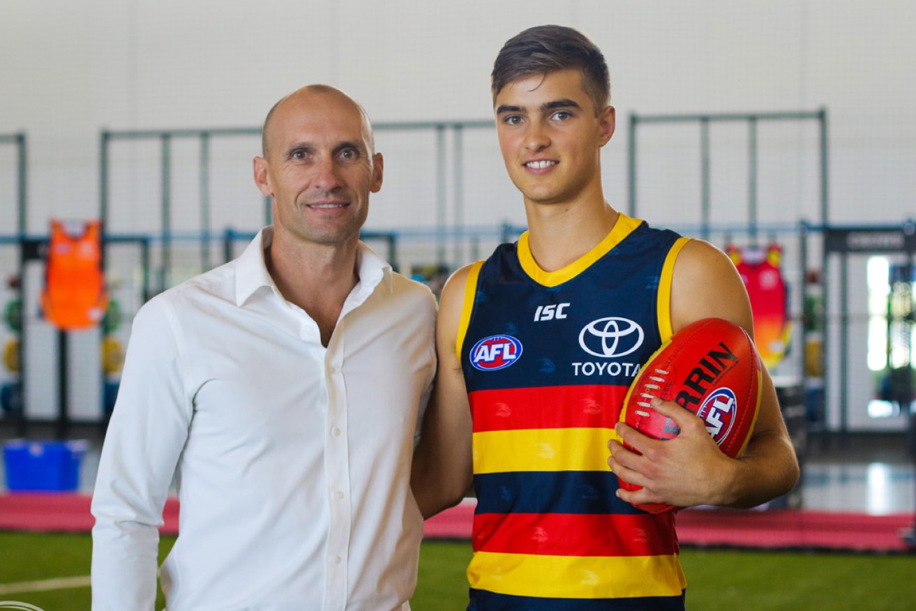Crows legend Tyson Edwards with son - and new recruit - Jackson. Photo: Brayden Chamberlin / Adelaide Football Club