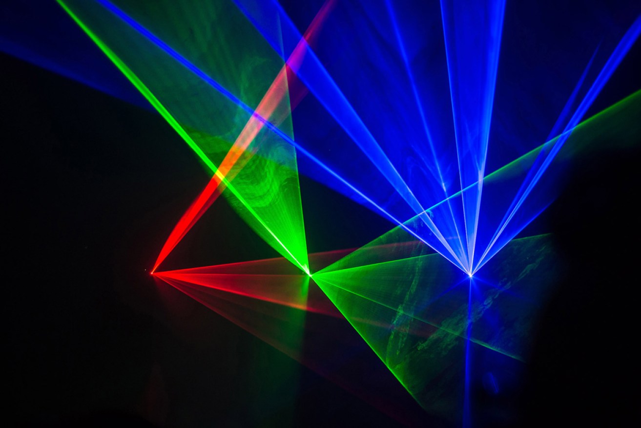 A laser display during a show by Atom and Robin Fox at Unsound Adelaide in 2015. Photo: Rob Sferco
