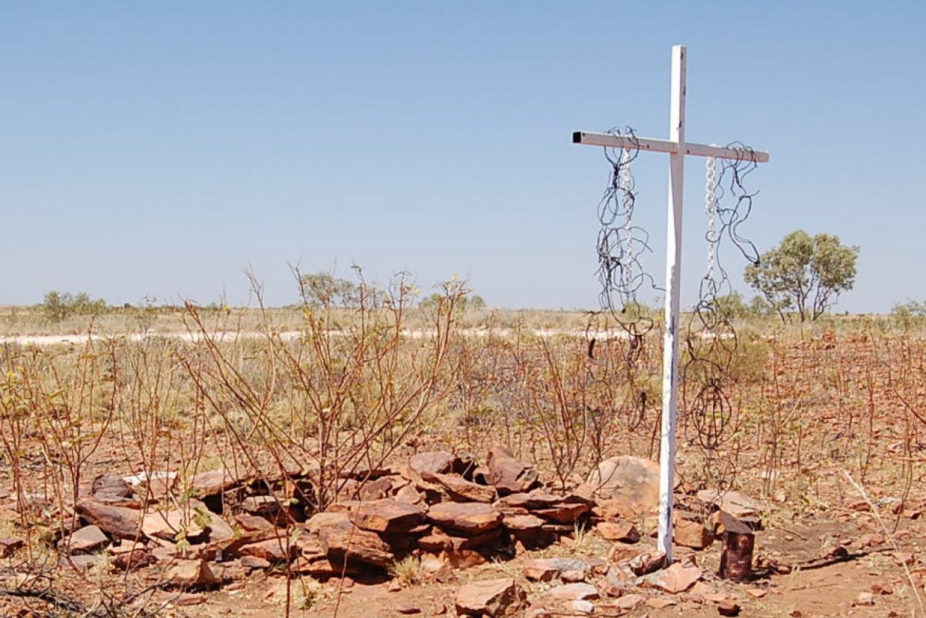 A cross was erected during the 1996 remembering ceremony of the Sturt Creek massacre. Pam Smith, Author provided