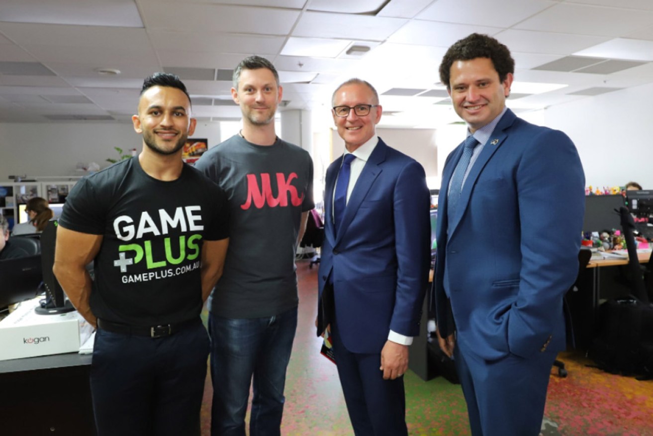 Game Plus co-founder Amit Oberoi with Mighty Kingdom director Phil Mayes, Premier Jay Weatherill and Employment Minister Kyam Maher at this morning's announcement. Photo: @JayWeatherill / Twitter
